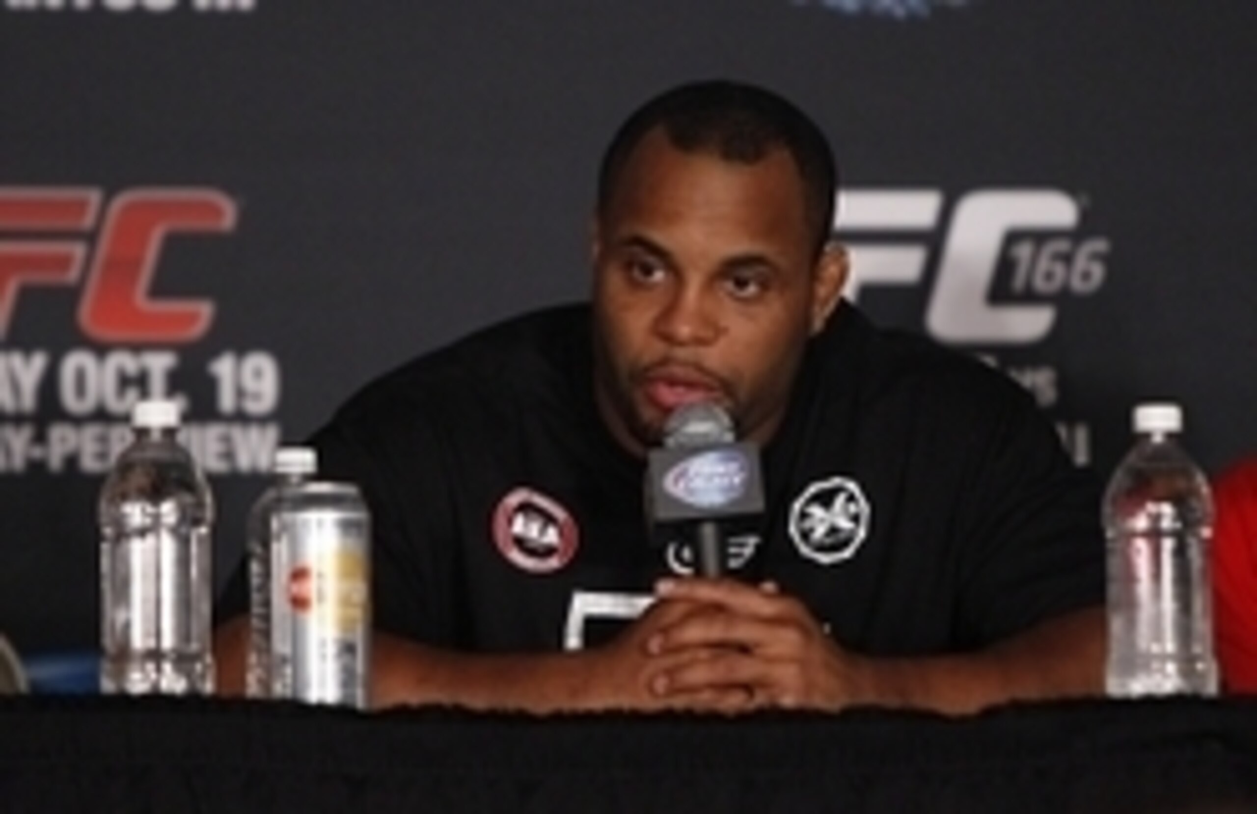 Oct 19, 2013; Houston, TX, USA; Daniel Cormier answers a question during the press conference following UFC 166 at Toyota Center. Mandatory Credit: Andrew Richardson-USA TODAY Sports