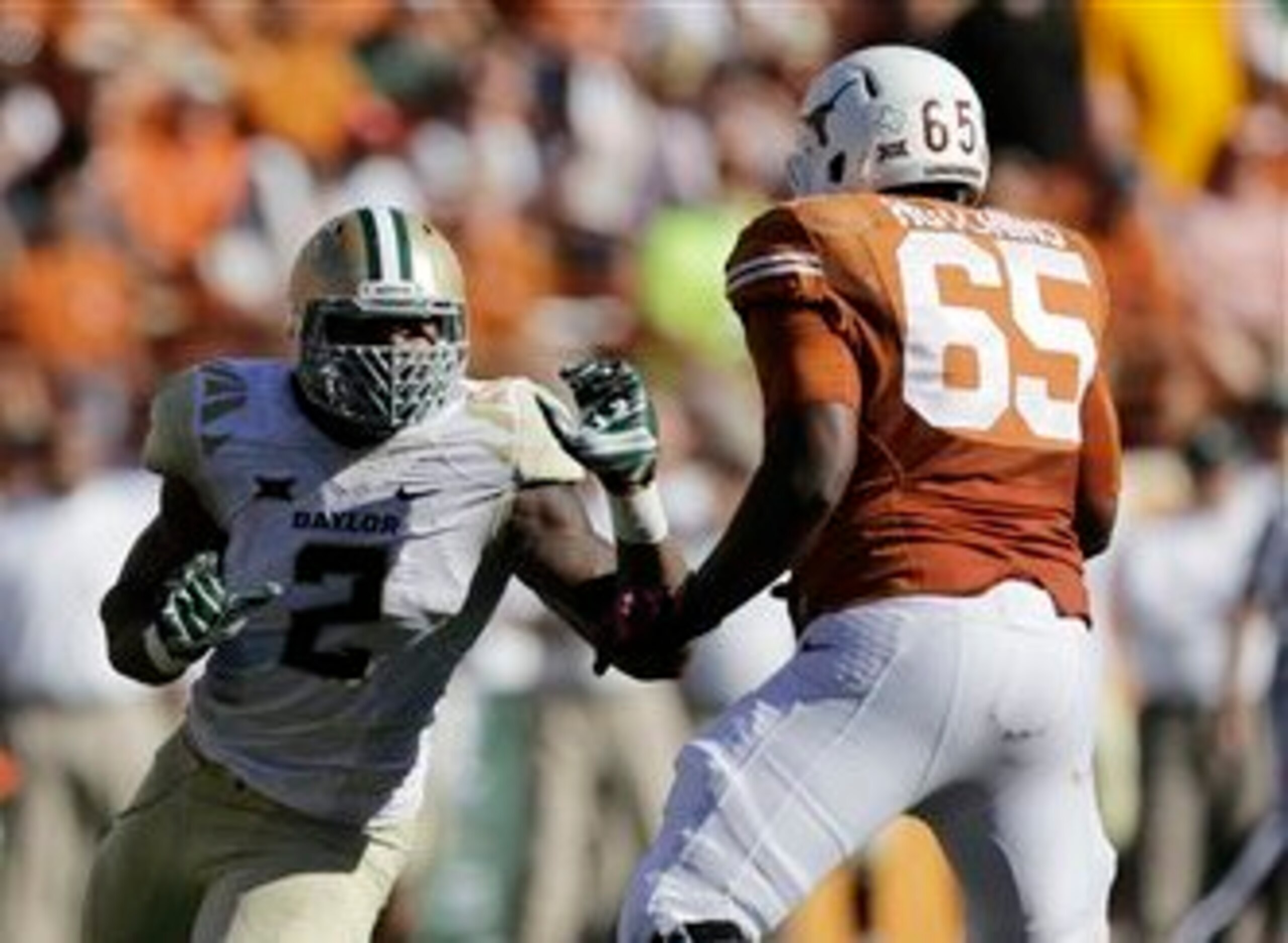 Hodges should quickly unseat Hutchins (right), who has had a rough transition into one of football's toughest positions.