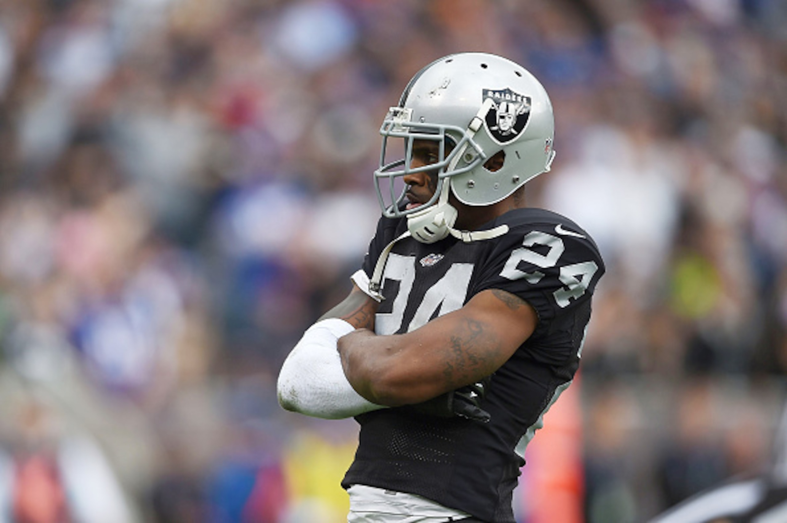 Any head coach has to win over veterans like Charles Woodson.