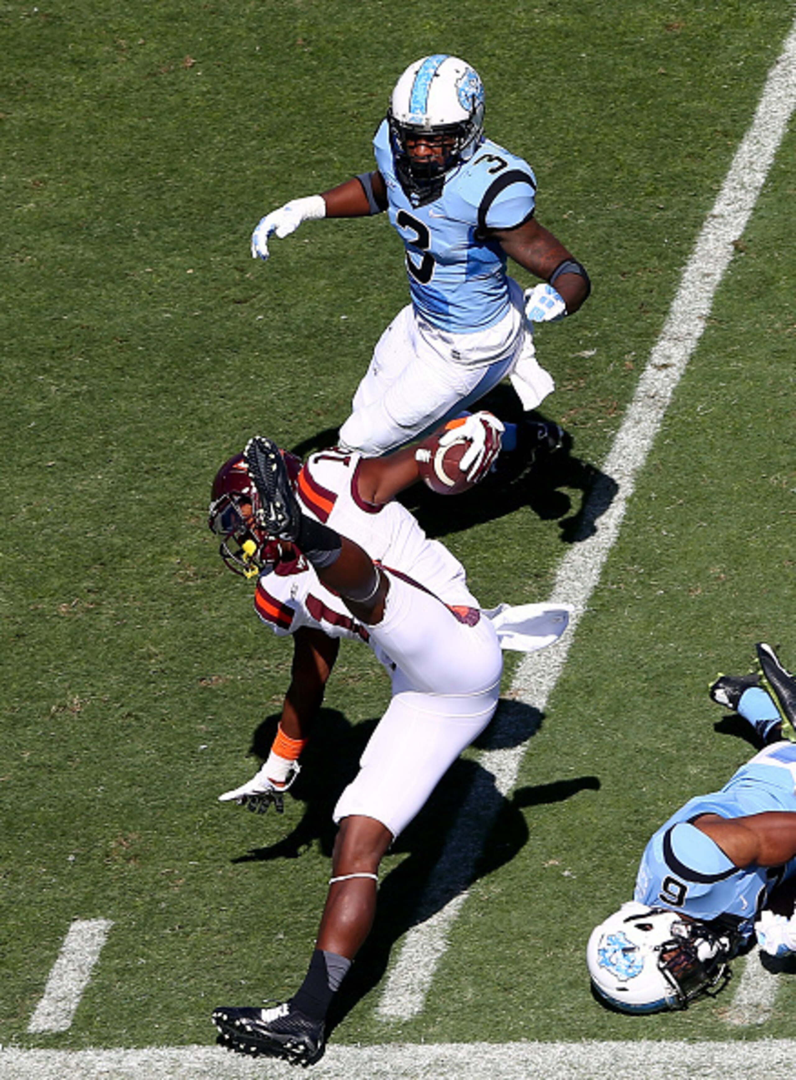 Cam Phillips with an acrobatic catch along the sideline in a win at North Carolina