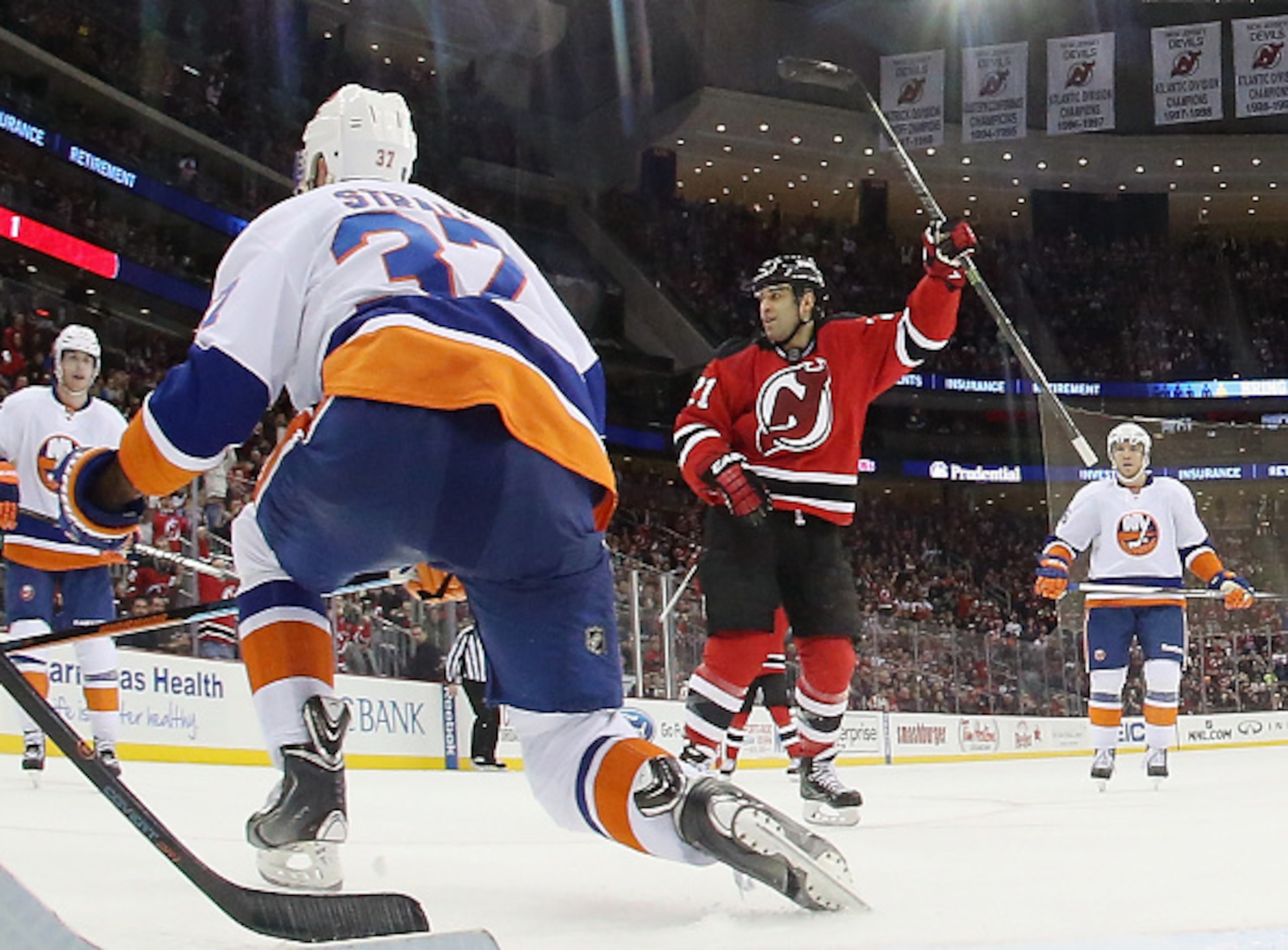 Scott Gomez celebrates a goal against the New York Islanders.