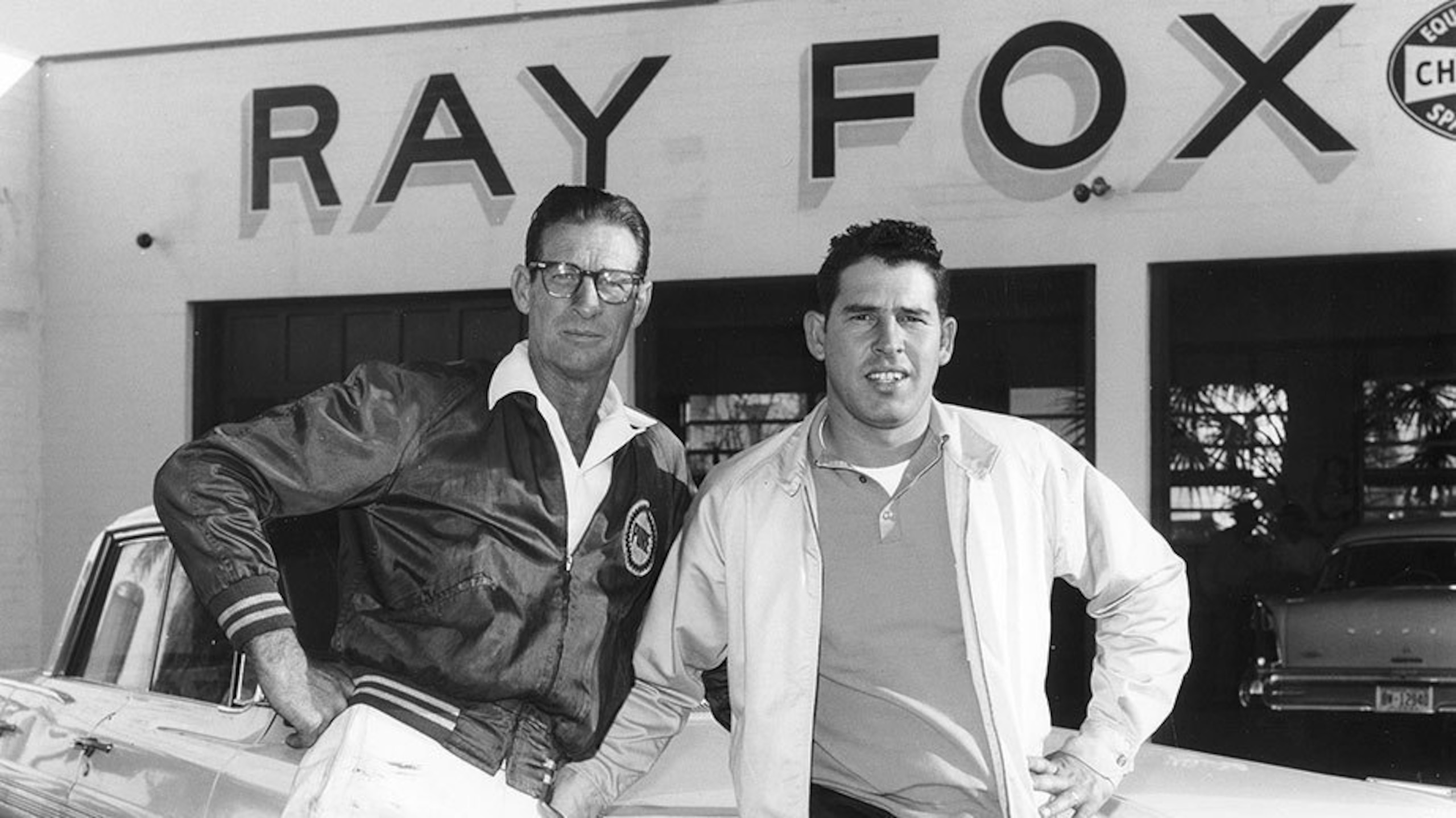 Raymond Fox (left) and three-time NASCAR champ David Pearson.