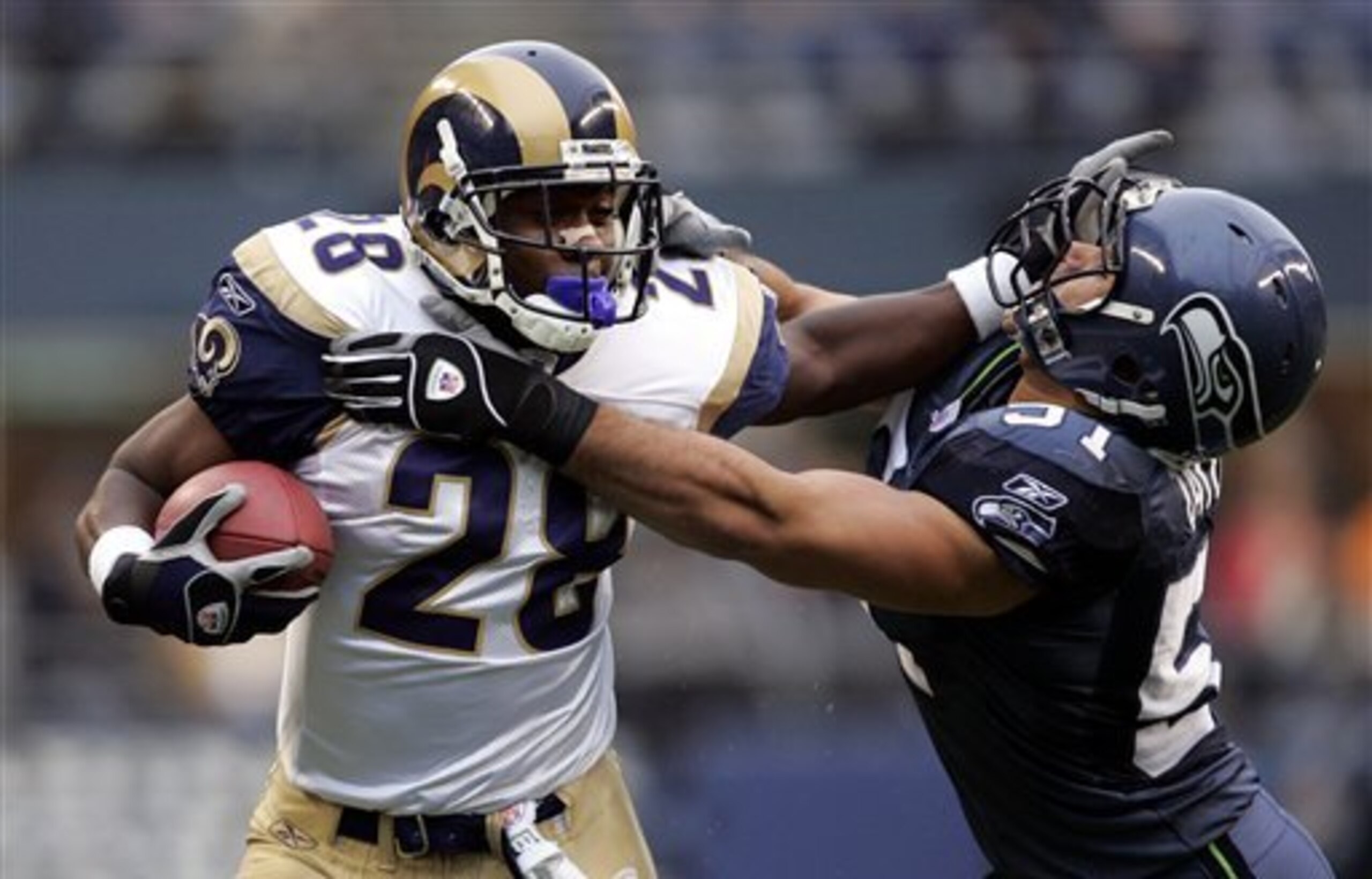 In 2000, Marshall Faulk had one of the greatest seasons ever for one of the NFL's all-time great offenses.
