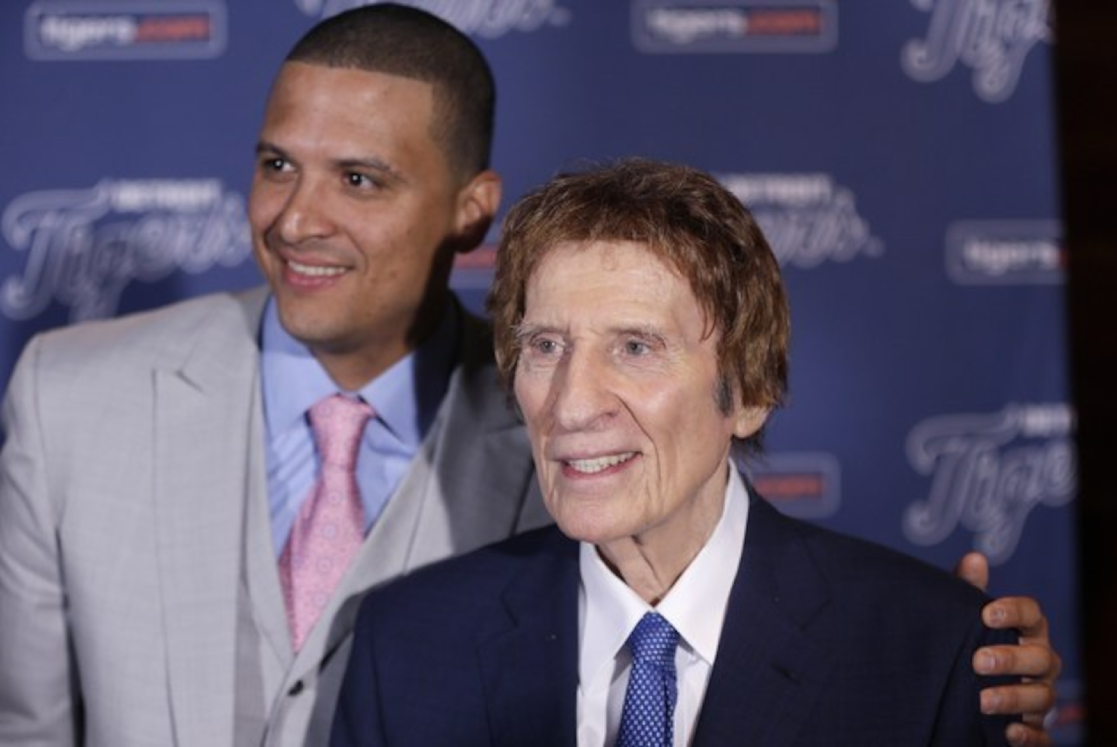 Two happy campers: Victor Martinez and Tigers owner Mike Ilitch.