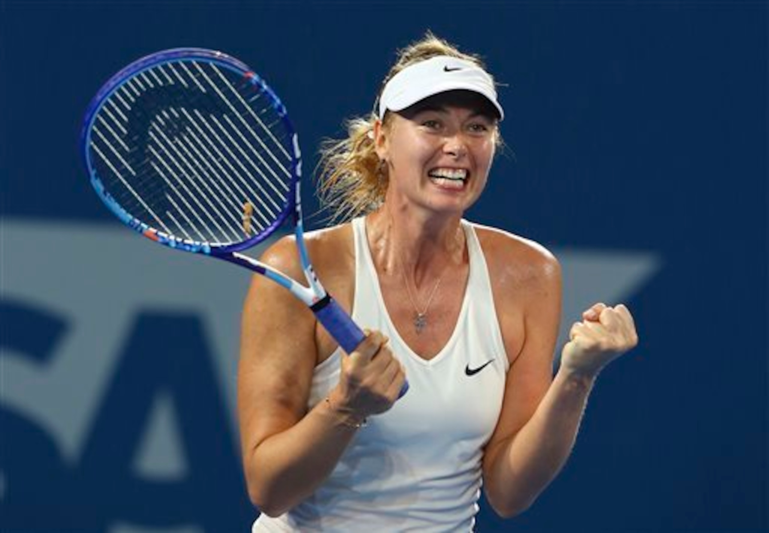 Maria Sharapova celebrates winning the Brisbane final.