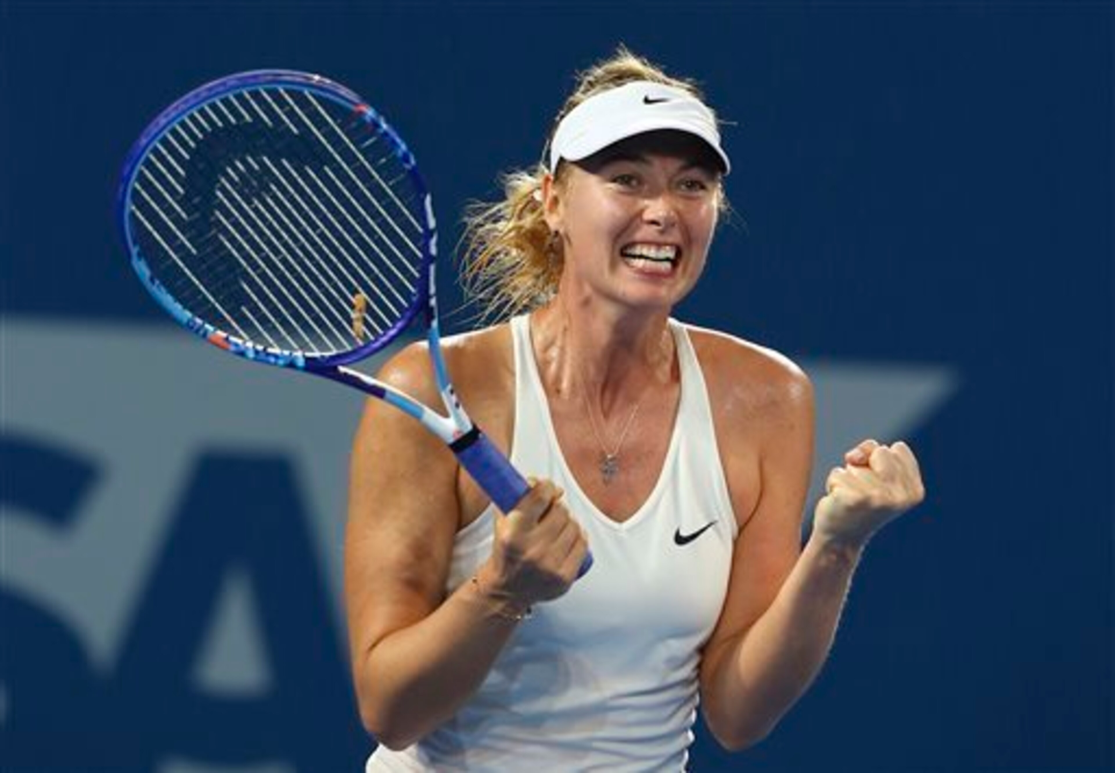 Maria Sharapova celebrates winning the Brisbane final. Maria Sharapova celebrates winning the Brisbane final.