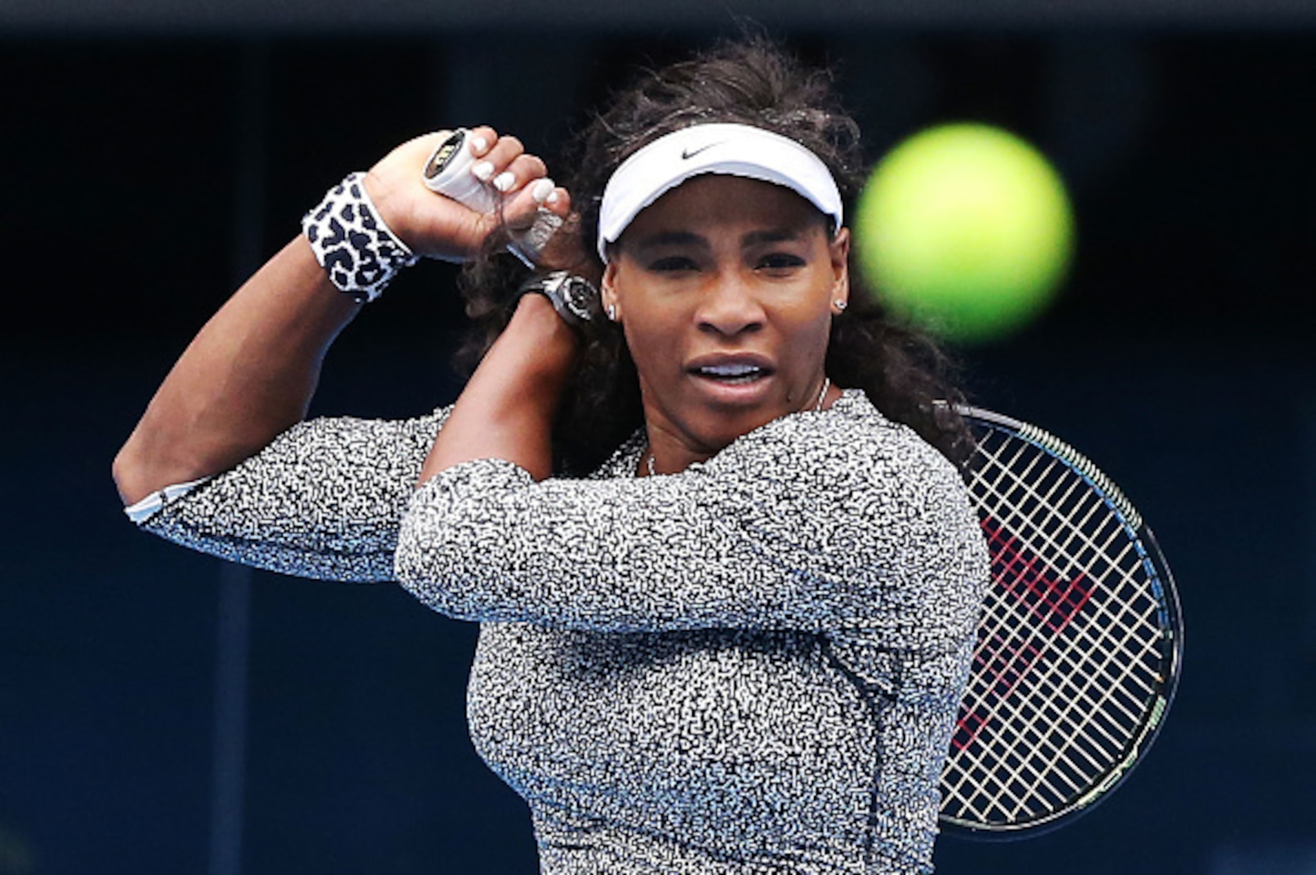 Serena Williams stays focused on the ball during practice at the 2015 Australian Open.