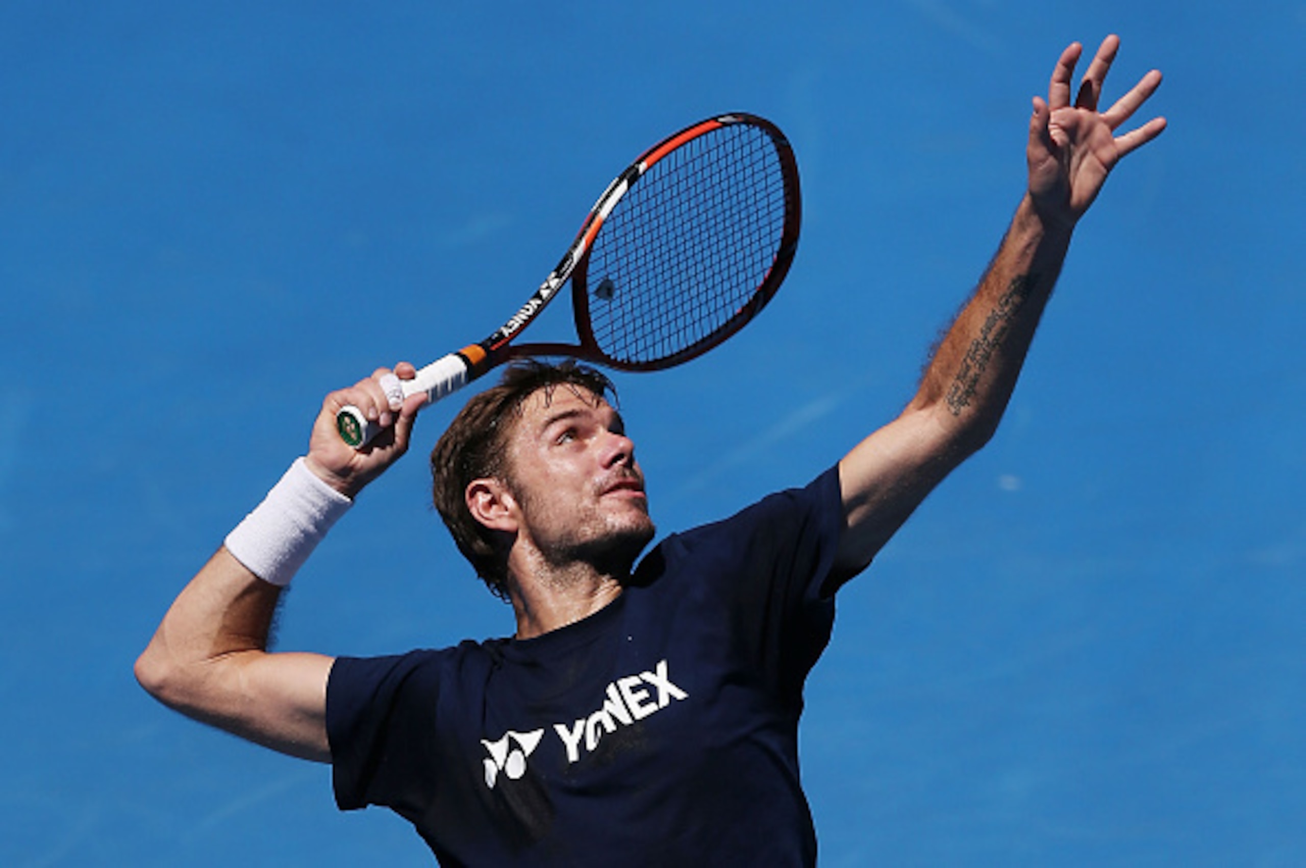 Stan Wawrinka in serving pose before the 2015 Australian Open.