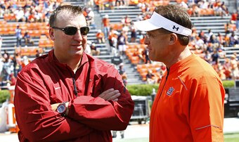 Arkansas head coach Bret Bielema and Auburn head coach Gus Malzahn Arkansas head coach Bret Bielema and Auburn head coach Gus Malzahn