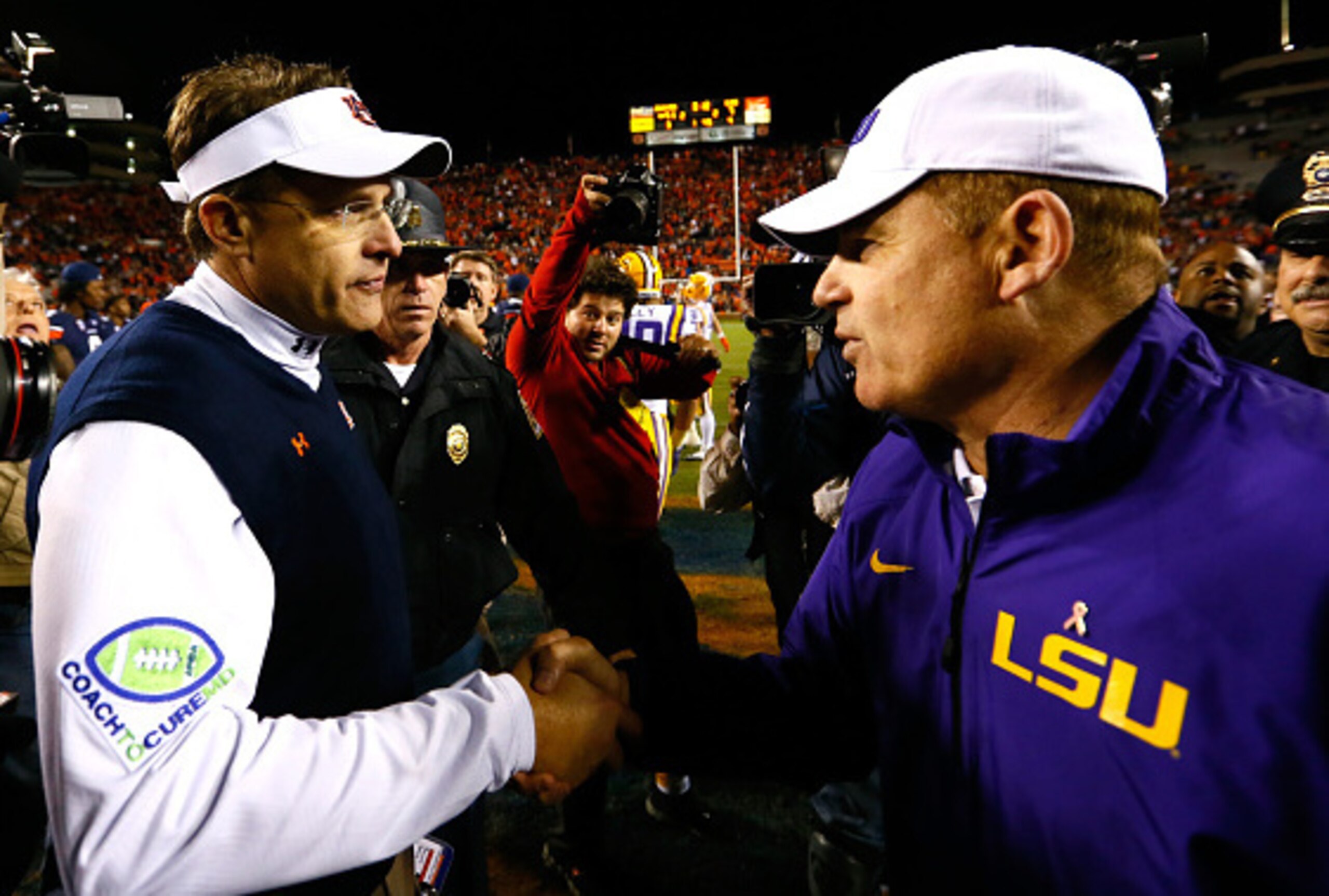 Auburn head coach Gus Malzahn (left) and LSU head coach Les Miles (right)