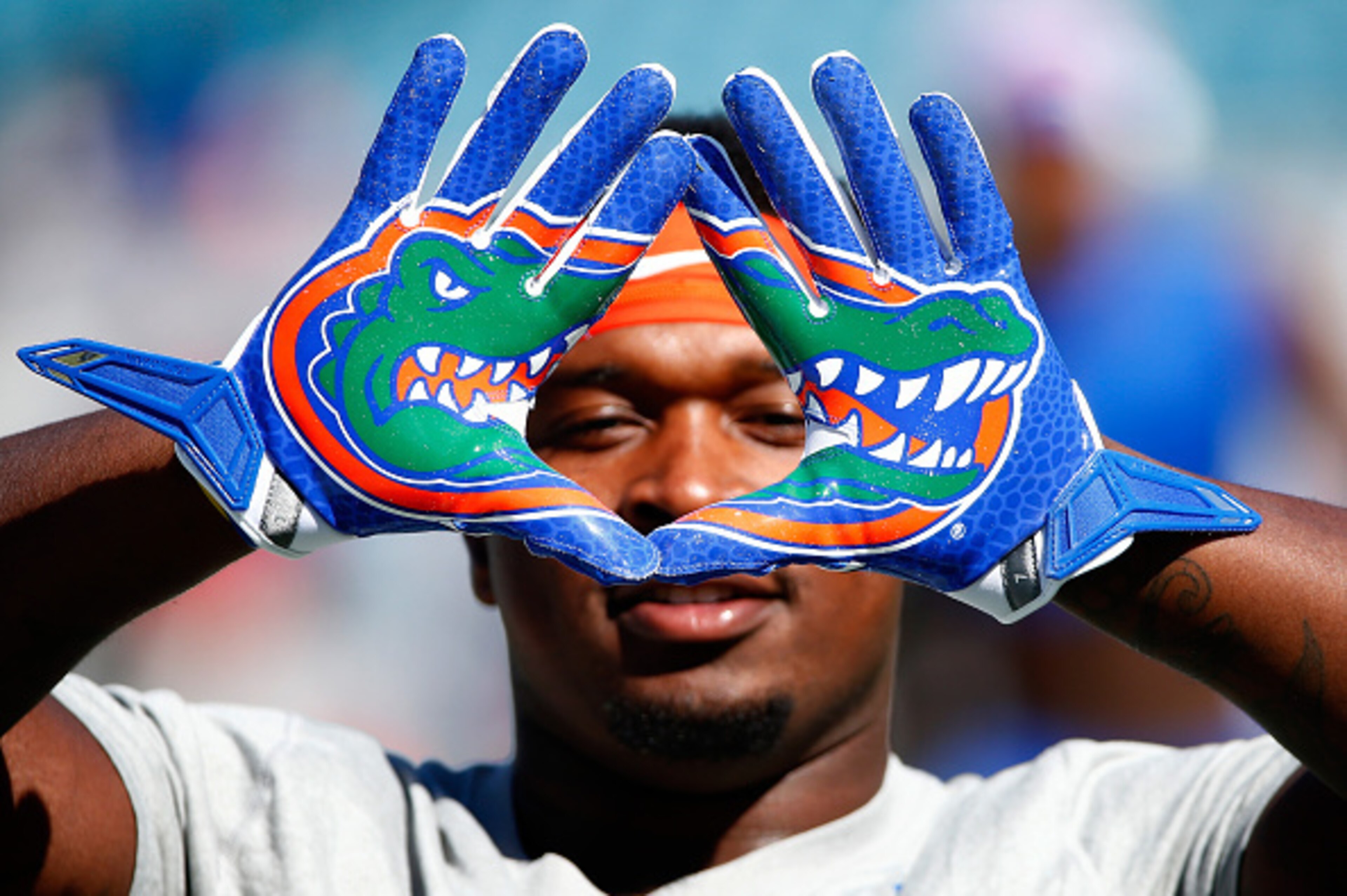 JACKSONVILLE, FL - NOVEMBER 01:  Adam Lane #22 of the Florida Gators displays his gloves before the game against the Georgia Bulldogs at EverBank Field on November 1, 2014 in Jacksonville, Florida.  (Photo by Sam Greenwood/Getty Images)