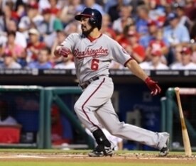 Aug 27, 2014; Philadelphia, PA, USA; Washington Nationals third baseman Anthony Rendon (6) hits an RBI double during the first inning of a game against the Philadelphia Phillies at Citizens Bank Park. Mandatory Credit: Bill Streicher-USA TODAY Sports