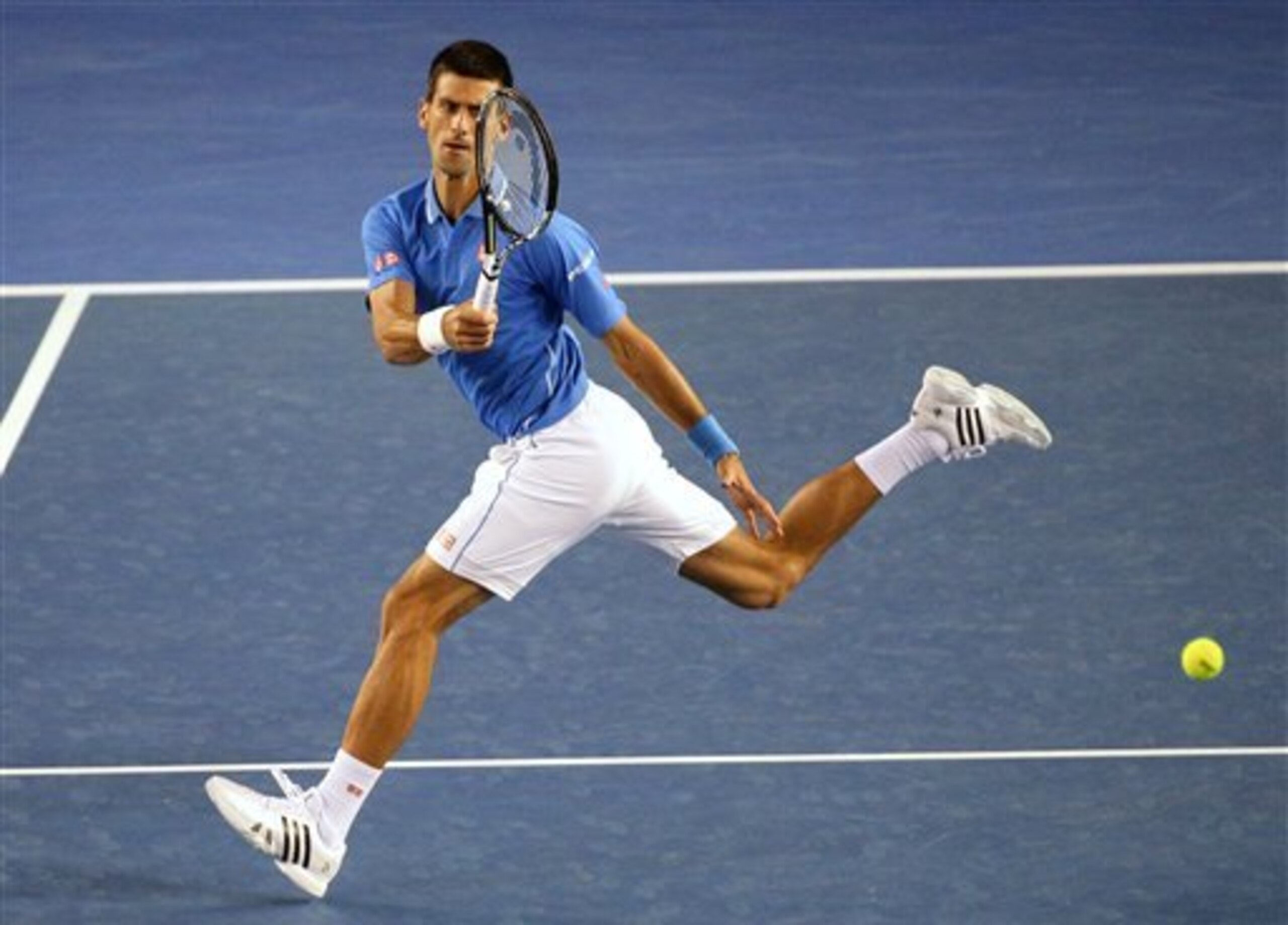 Novak Djokovic hits a running forehand during his quarterfinal match at the 2015 Australian Open.