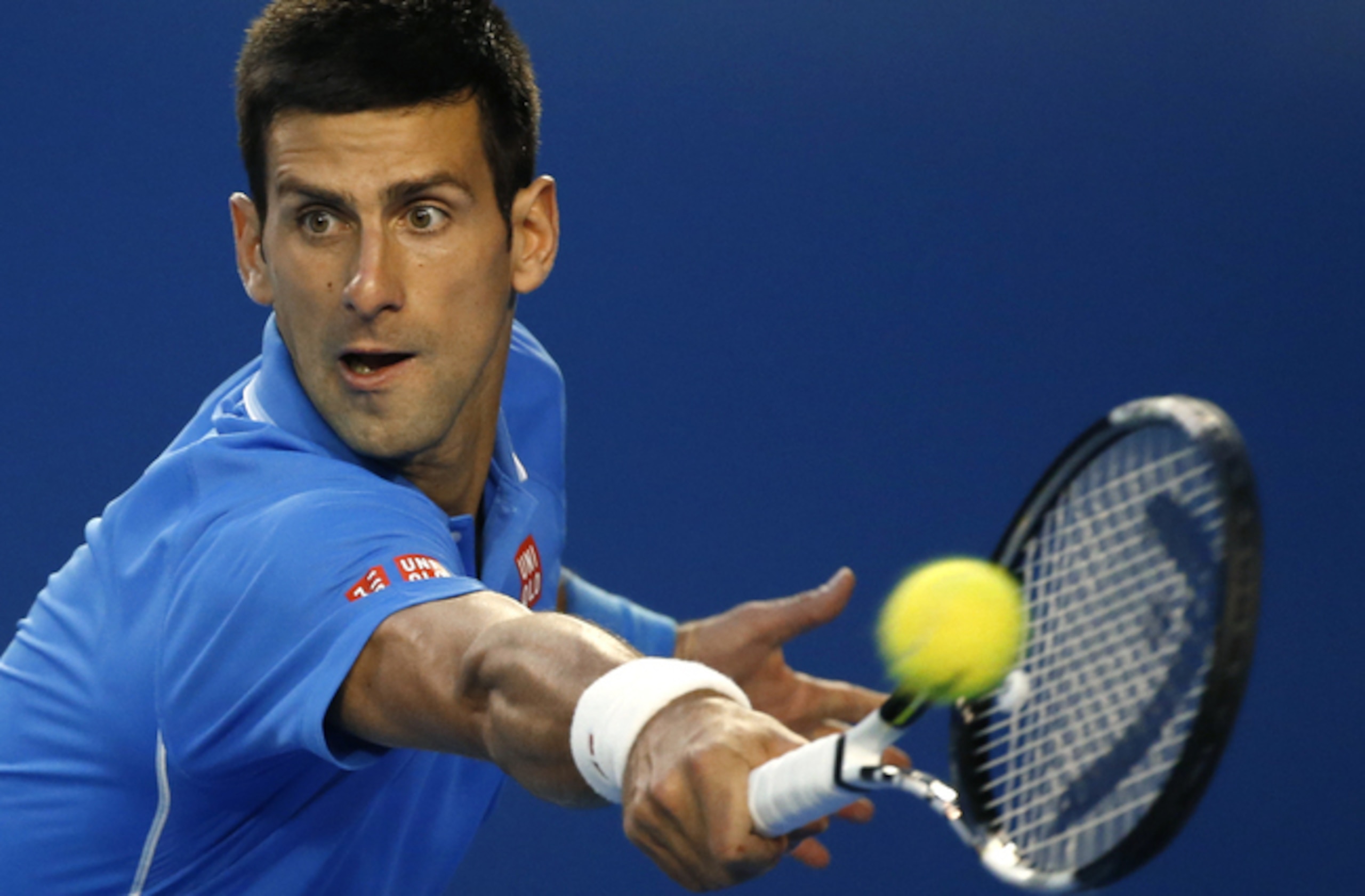 Novak Djokovic takes his eyes off the ball for a moment during his quarterfinal match at the 2015 Australian Open.