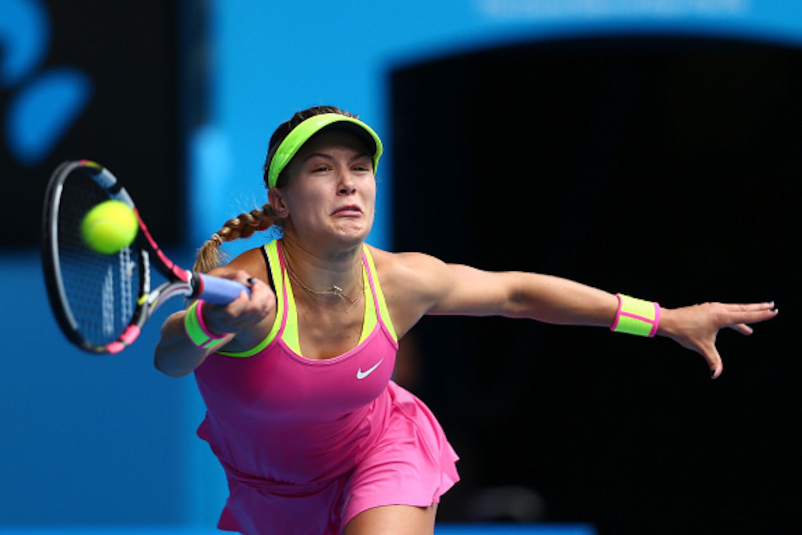 MELBOURNE, AUSTRALIA - JANUARY 27:  Eugenie Bouchard of Canada plays a forehand in her quarterfinal match against Maria Sharapova of Russia during day nine of the 2015 Australian Open at Melbourne Park on January 27, 2015 in Melbourne, Australia.  (Photo 