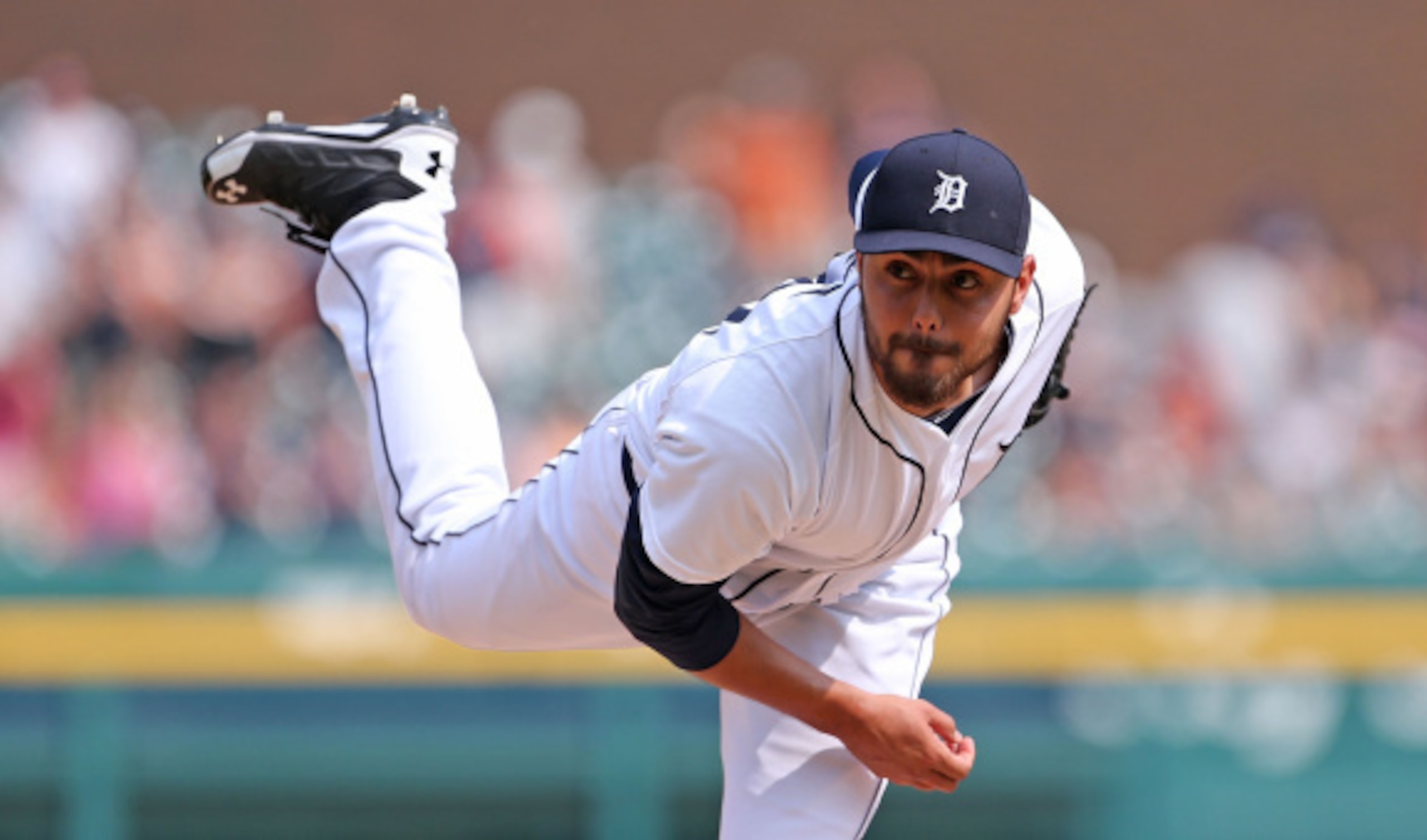 DETROIT, MI - AUGUST 03: Joakim Soria #38 of the Detroit Tigers pitches in the ninth inning of the game against the Colorado Rockies at Comerica Park on August 3, 2014 in Detroit, Michigan. The Tigers defeated the Rockies 4-0.  (Photo by Leon Halip/Getty 
