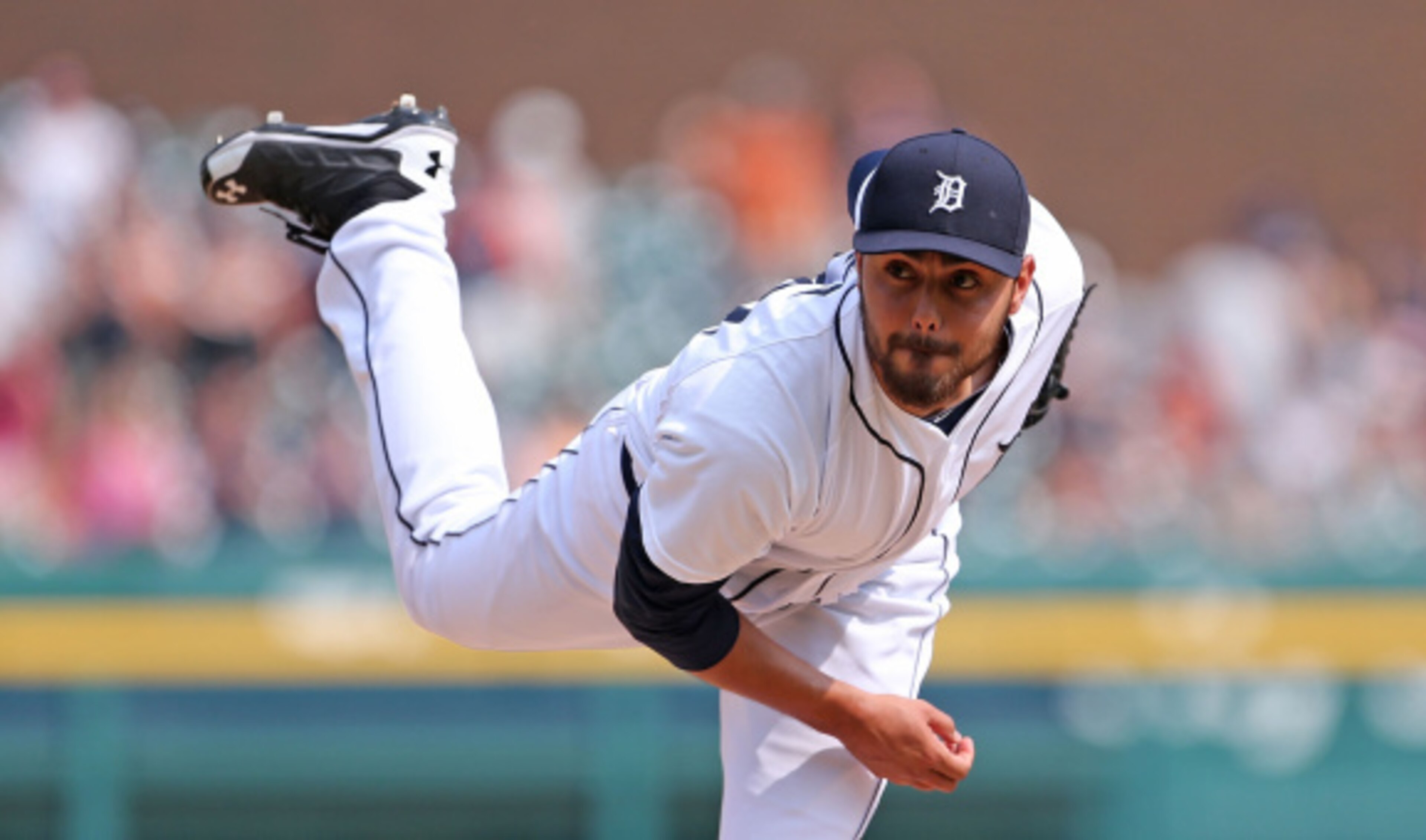 DETROIT, MI - AUGUST 03: Joakim Soria #38 of the Detroit Tigers pitches in the ninth inning of the game against the Colorado Rockies at Comerica Park on August 3, 2014 in Detroit, Michigan. The Tigers defeated the Rockies 4-0.  (Photo by Leon Halip/Getty 