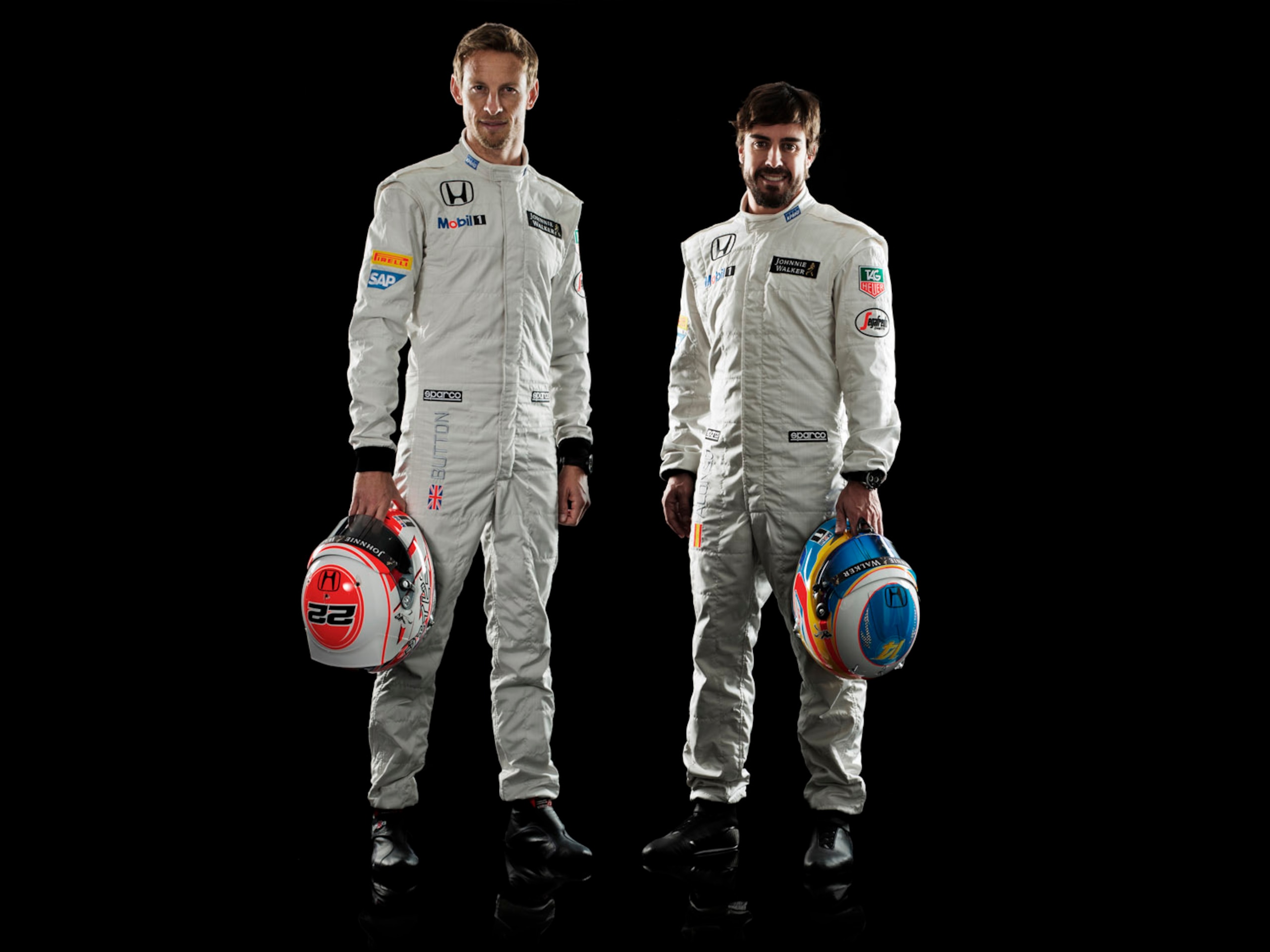 Drivers Jenson Button and Fernando Alonso.
