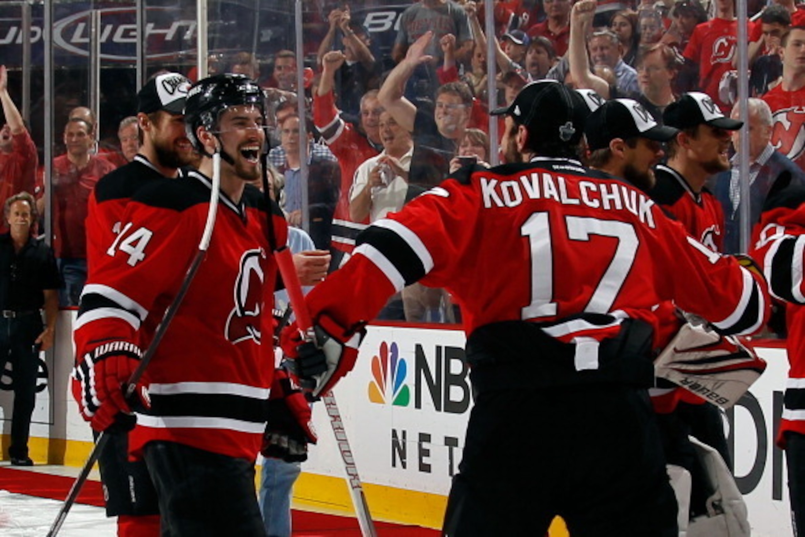 Ilya Kovalchuk and Adam Henrique celebrate winning the Eastern Conference Final against the New York Rangers.