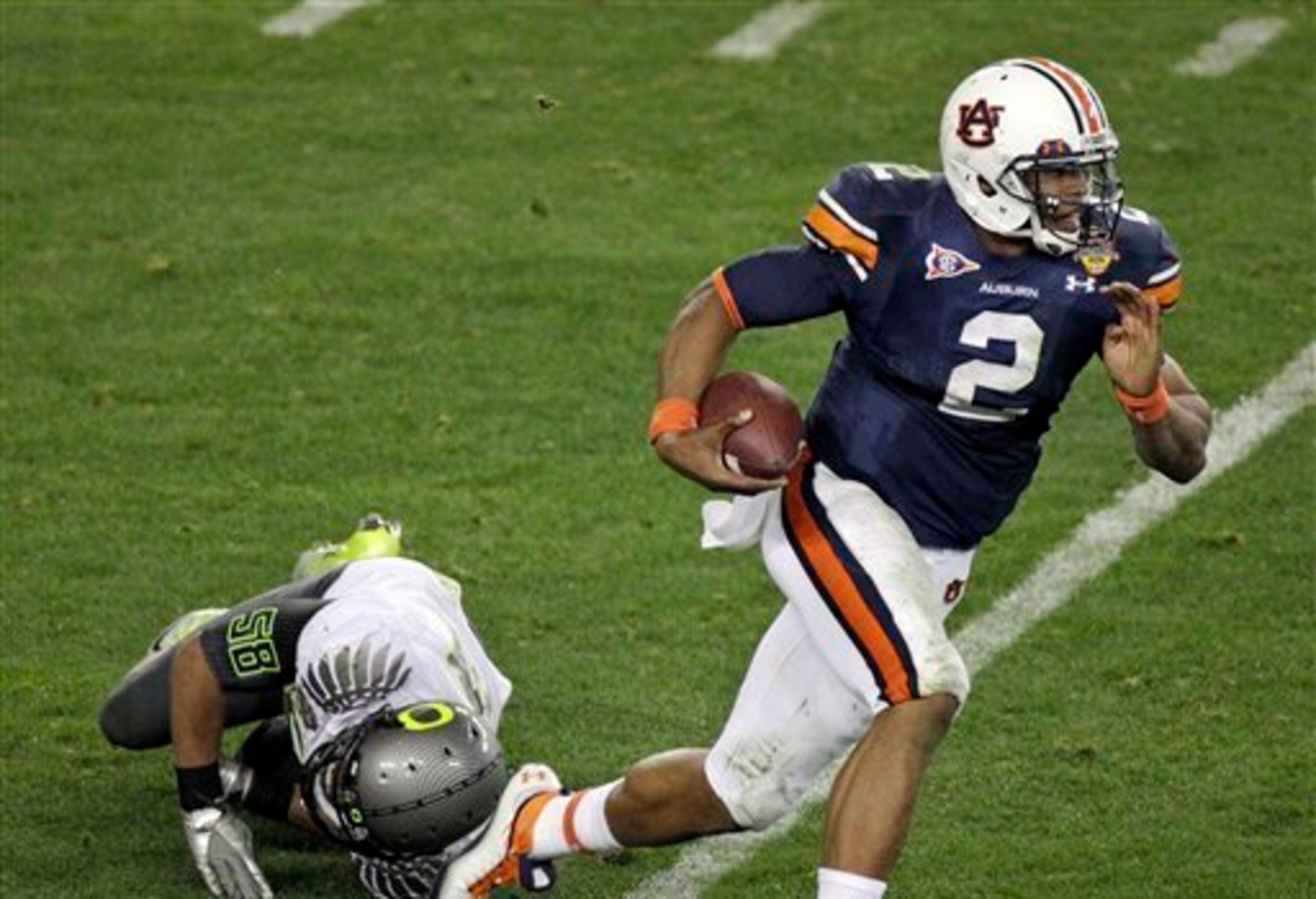 Cam Newton led Auburn's charge to a 2010 national title. Cam Newton led Auburn's charge to a 2010 national title.