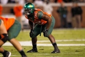 Oct 4, 2014; Atlanta, GA, USA; Miami Hurricanes linebacker Denzel Perryman (52) in action against the Georgia Tech Yellow Jackets in the first quarter at Bobby Dodd Stadium. Mandatory Credit: Brett Davis-USA TODAY Sports