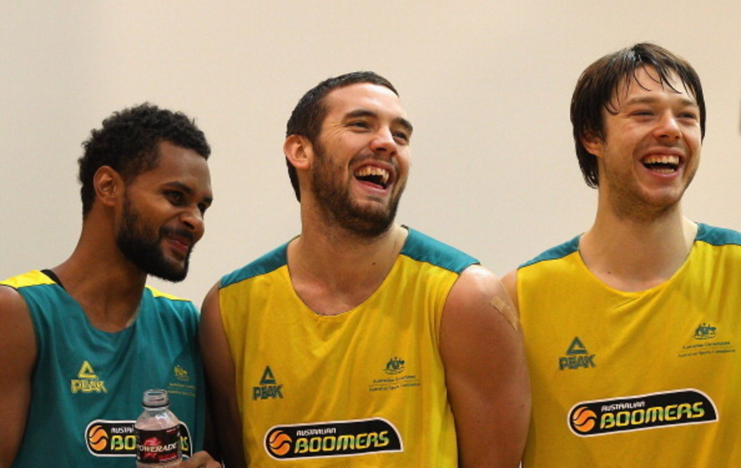 Patty Mills (far left) and Matthew Dellavedova (far right)