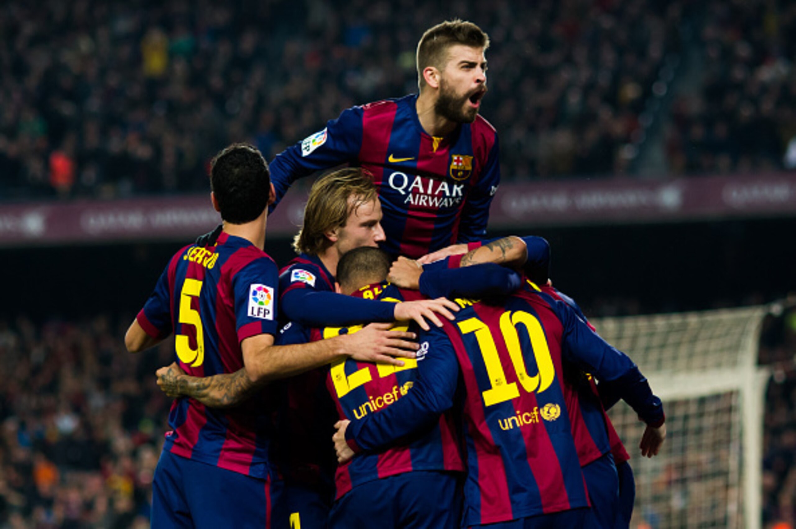 Pique (top) and Barcelona are riding high.