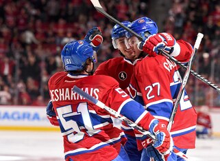 The Canadiens celebrate a goal.