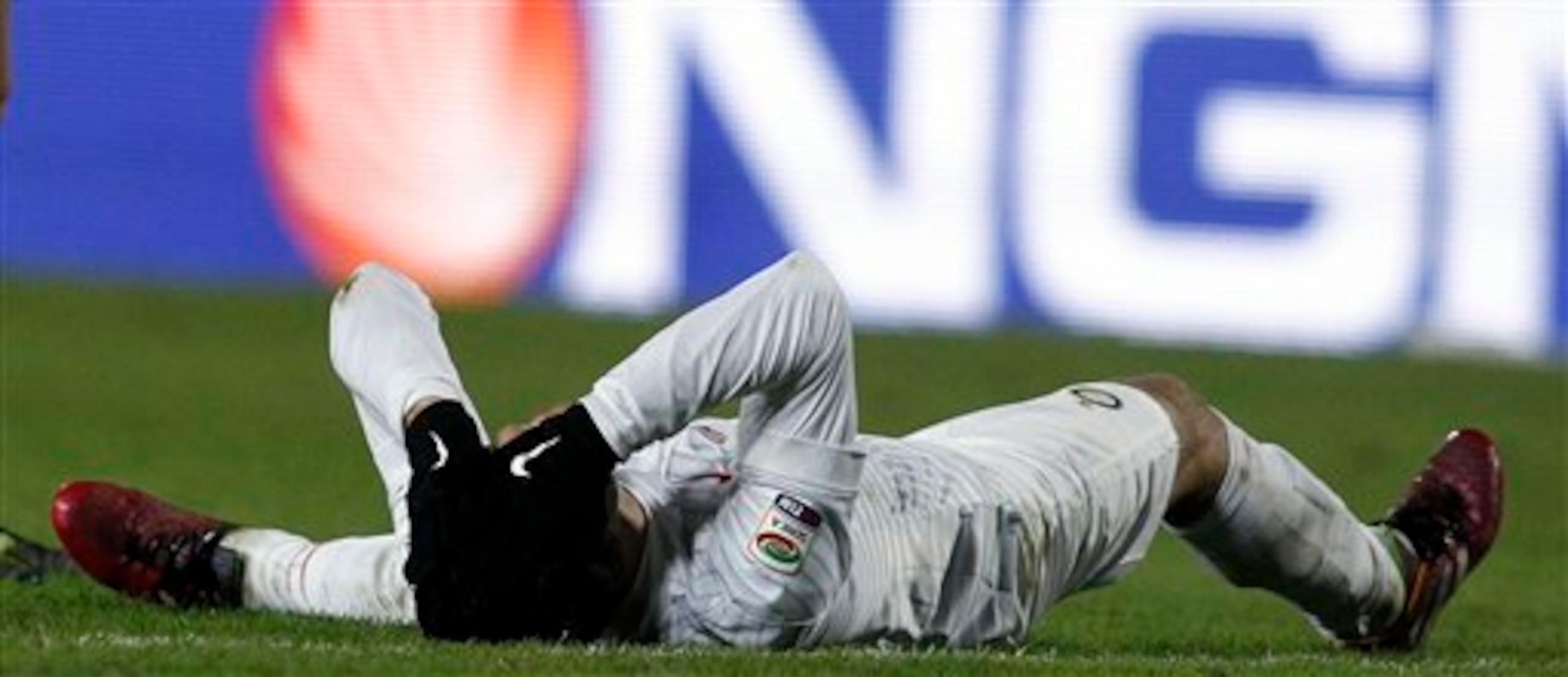 The familiar pose for Podolski: the missed chance.