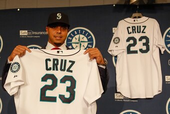 SEATTLE, WA - DECEMBER 04:  Nelson Cruz of the Seattle Mariners poses for a photo following his introductory press conference at Safeco Field on December 4, 2014 in Seattle, Washington.  (Photo by Otto Greule Jr/Getty Images)