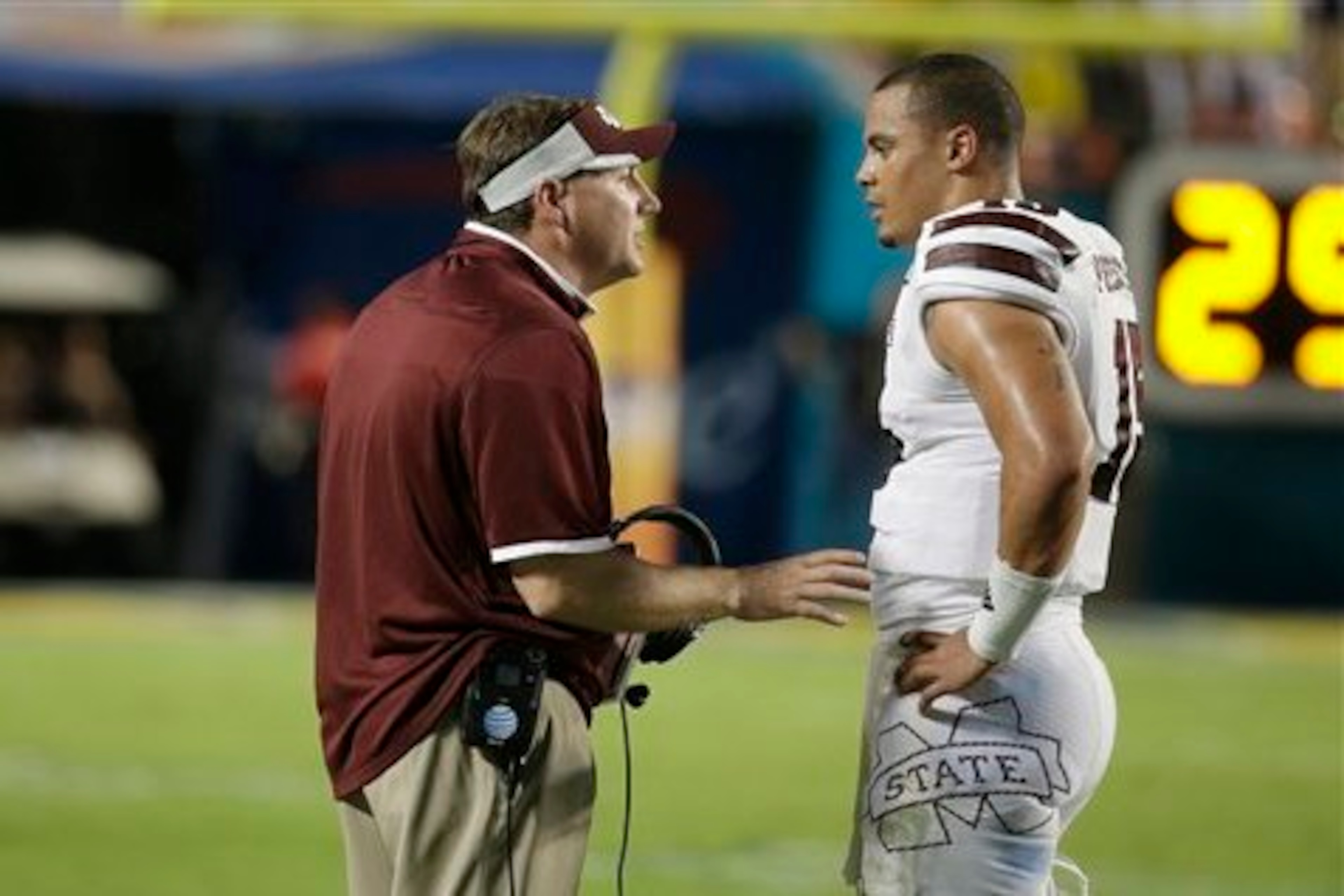 Mississippi State head coach Dan Mullen and Heisman trophy candidate Dak Prescott.