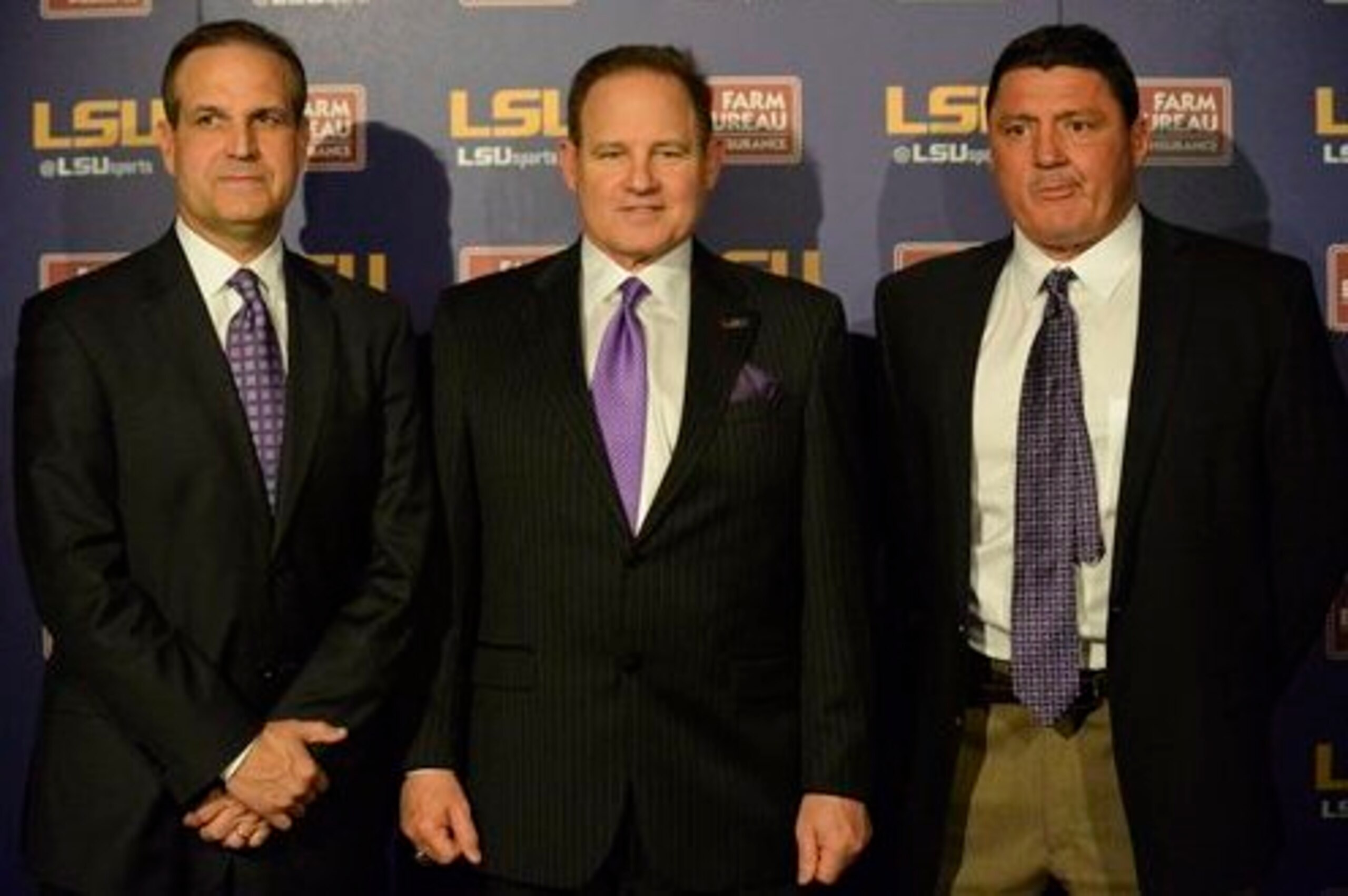 LSU defensive coordinator Kevin Steele (left), head coach Les Miles (center) and defensive line coach Ed Orgeron (right)