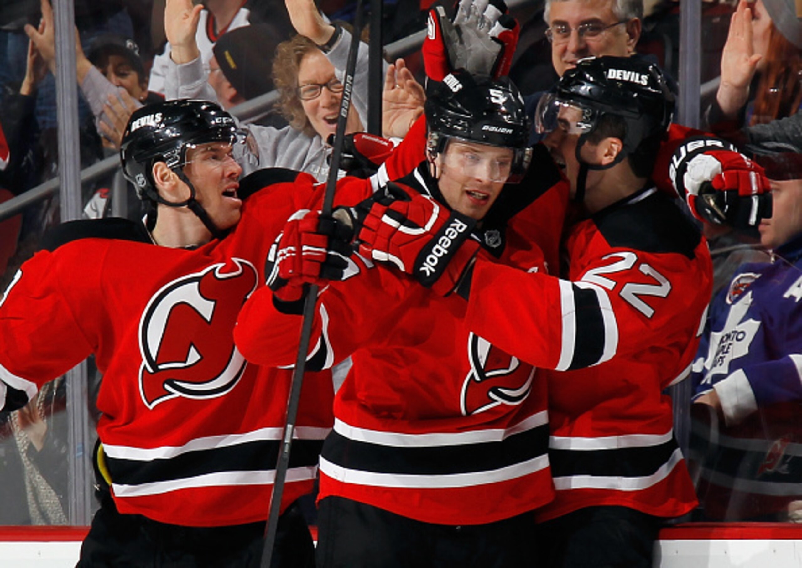 Adam Larsson gets mobbed by his teammates after scoring a game-tying goal against the Toronto Maple Leafs.