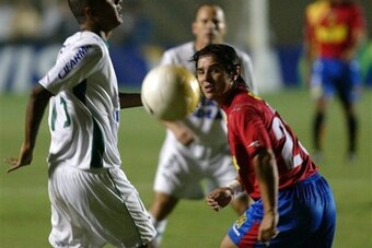 Tapia (right)