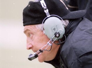 19 Nov 1994: Coach Larry Smith of the Missouri Tigers watches his players during a game against the Kansas Jayhawks at Memorial Stadium in Columbia, Missouri. Kansas won the game 31-14.