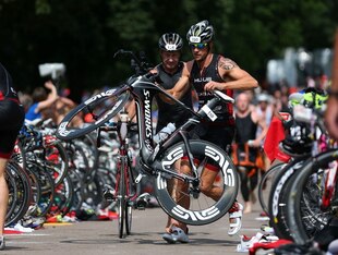 Jenson Button competing in a triathlon in 2013.