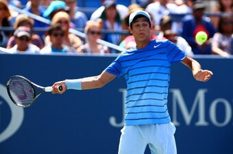 Mackenzie McDonald hits a forehand during a juniors match at the 2013 U.S. Open.