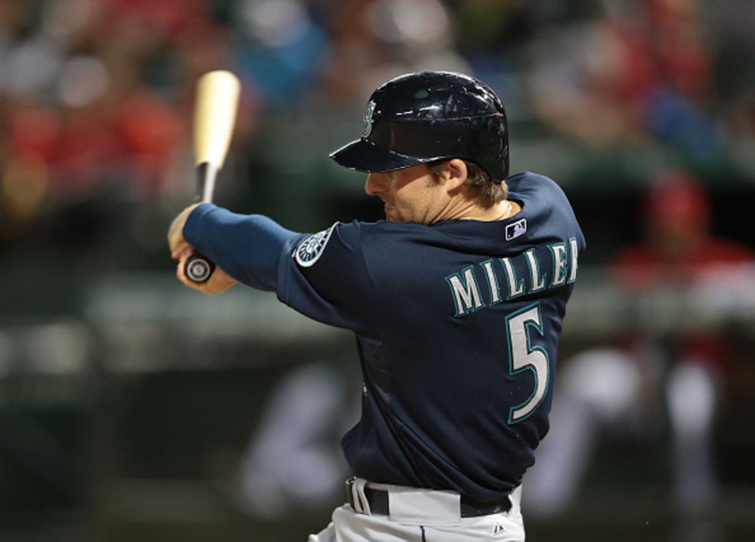 ARLINGTON, TX - SEPTEMBER 6: Brad Miller #5 of the Seattle Mariners hits in the seventh inning against the Texas Rangers  at Globe Life Park in Arlington on September 6, 2014 in Arlington, Texas.  (Photo by Rick Yeatts/Getty Images)