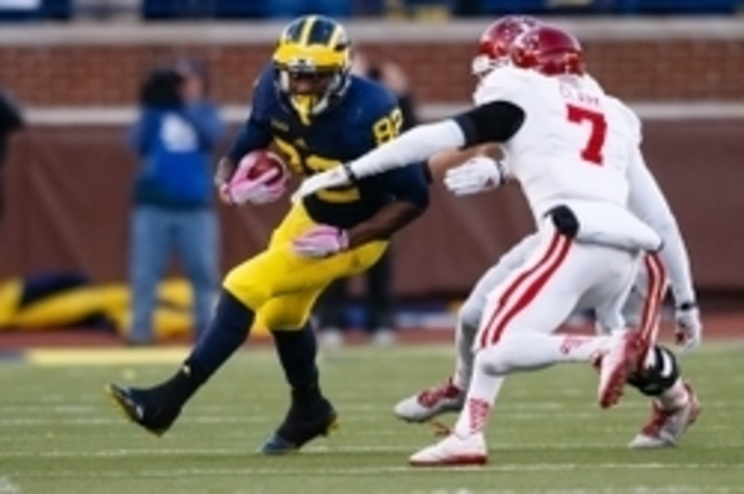 Nov 1, 2014; Ann Arbor, MI, USA; Michigan Wolverines wide receiver Amara Darboh (82) runs the ball at Indiana Hoosiers cornerback Donovan Clark (7) in the fourth quarter at Michigan Stadium. Mandatory Credit: Rick Osentoski-USA TODAY Sports