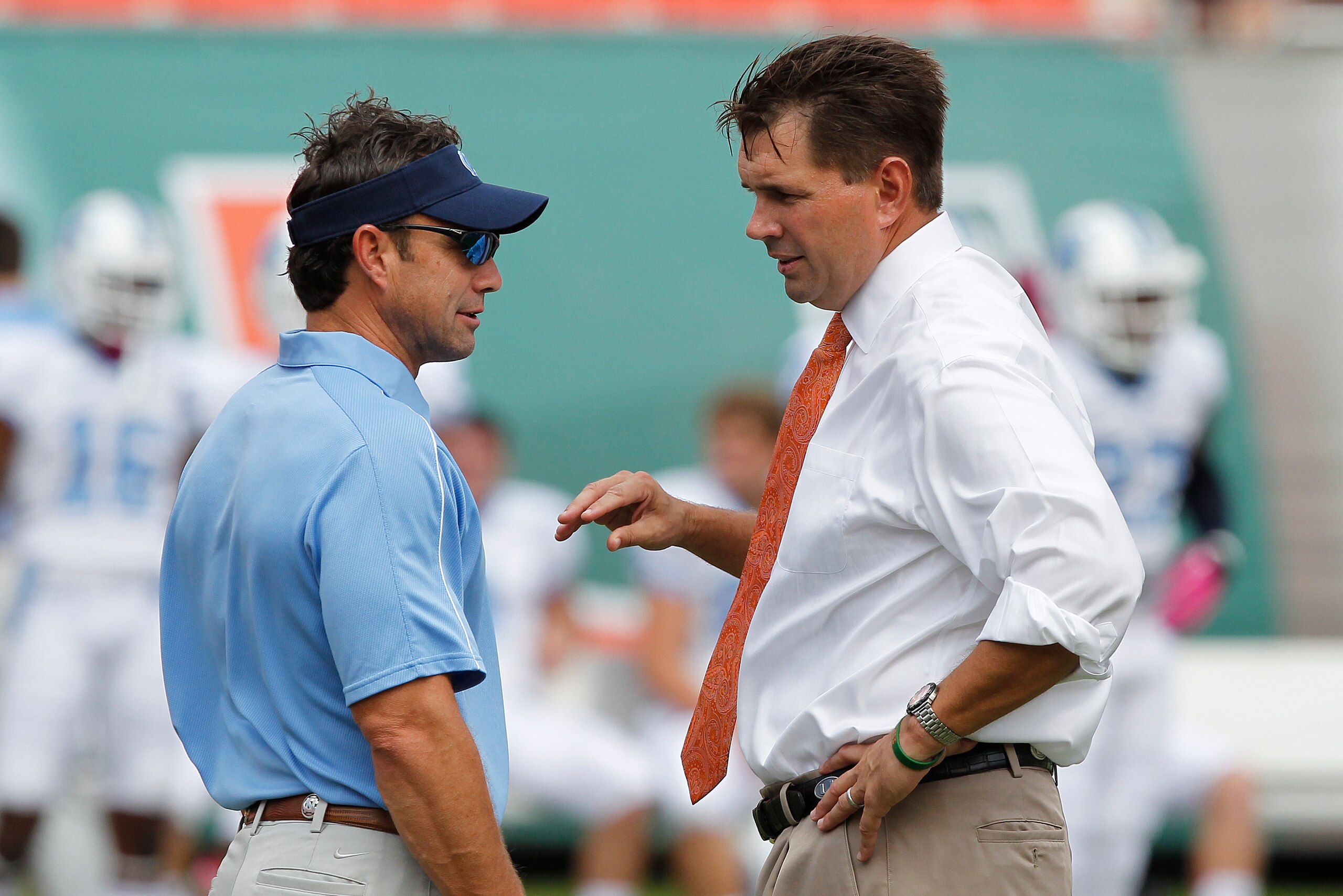 Neither North Carolina coach Larry Fedora (left) or Miami's Al Golden have lived up to expectations.