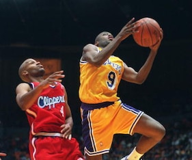 Nick Van Exel Attempts a Layup in 1994