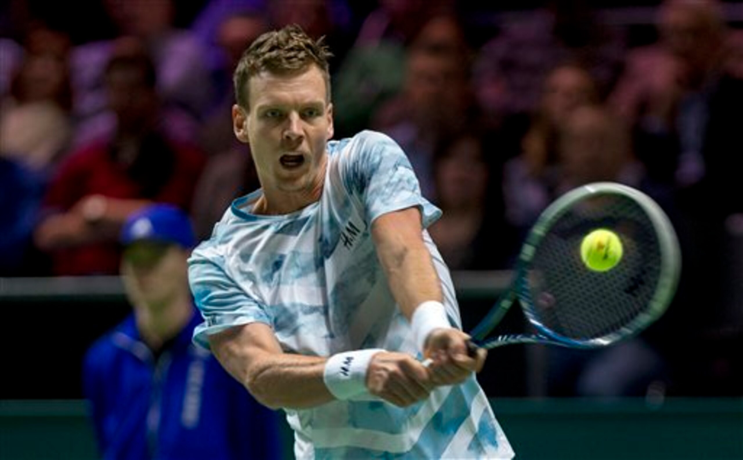 Tomas Berdcyh hits a backhand in a match in Rotterdam.