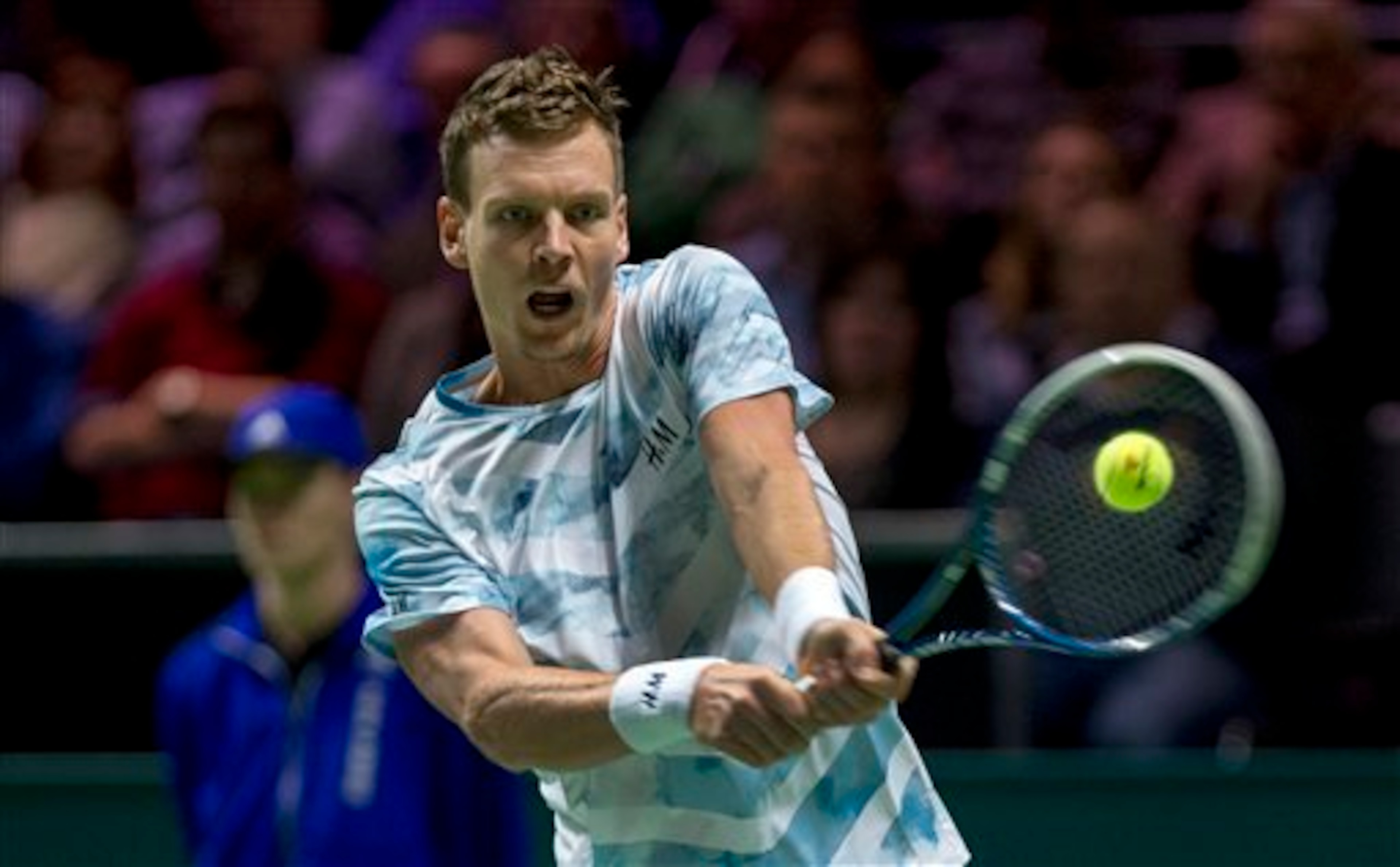 Tomas Berdcyh hits a backhand in a match in Rotterdam.