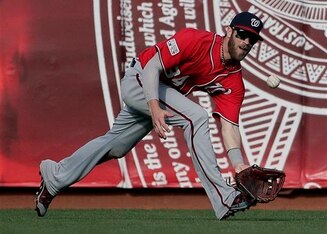 The spotlight on Bryce Harper intensifies in 2015 with a move to right field.