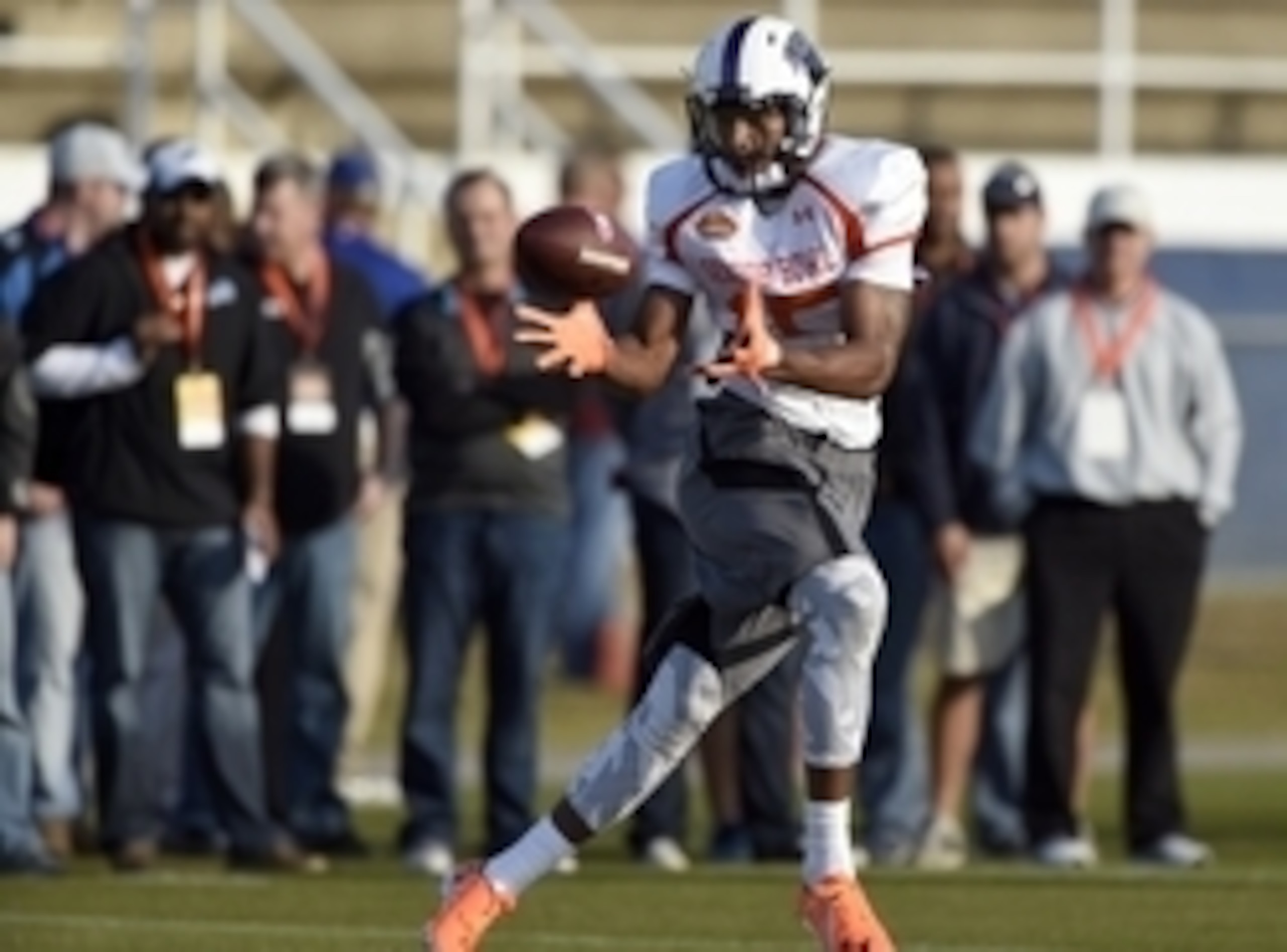 Wide receiver Dezmin Lewis has ideal size, but lacks straight-line speed and physicality.