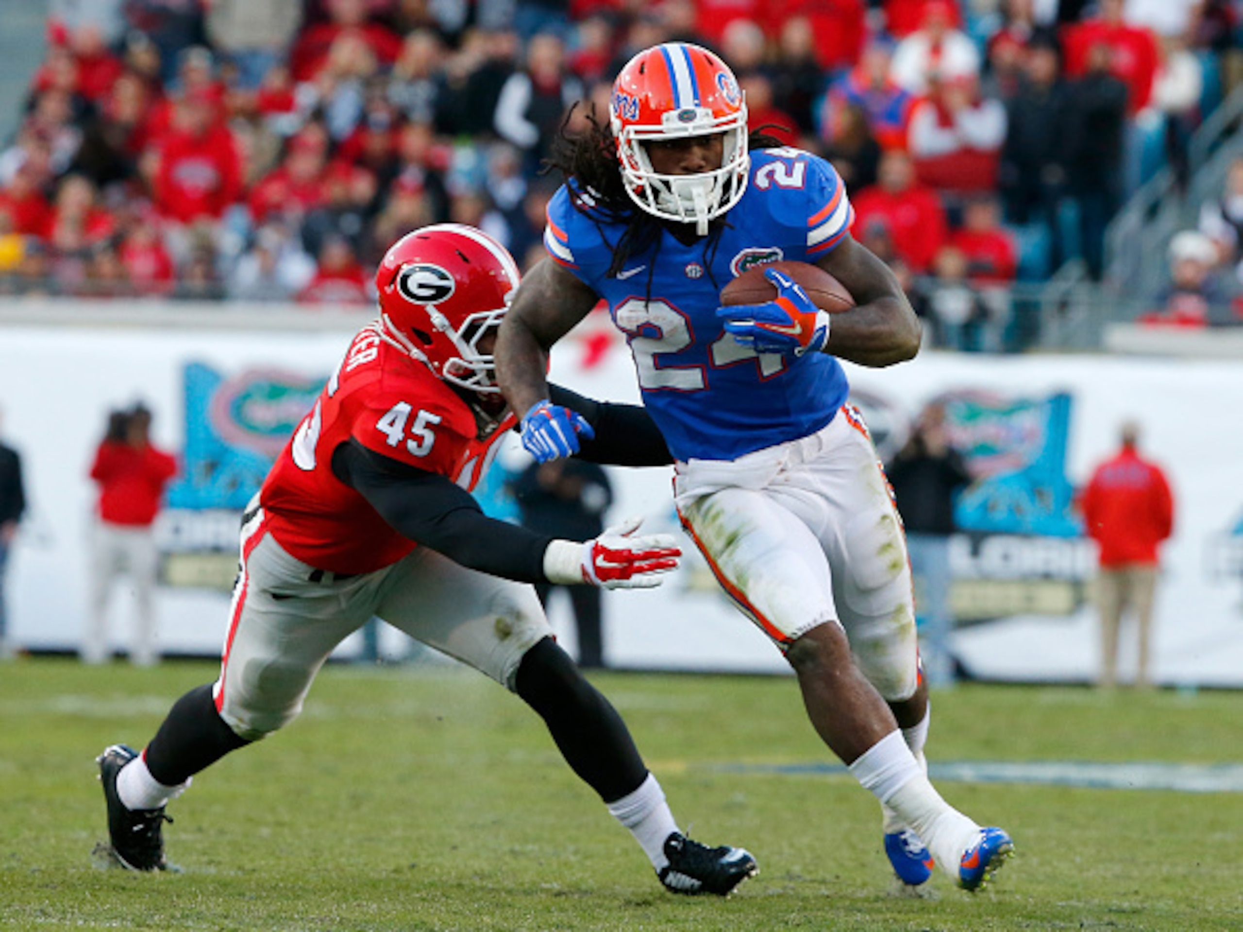 Reggie Carter misses a Florida runner.
