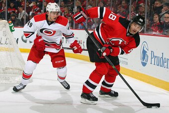 Jaromir Jagr controls the puck along the boards. Will he be in New Jersey past March 2?