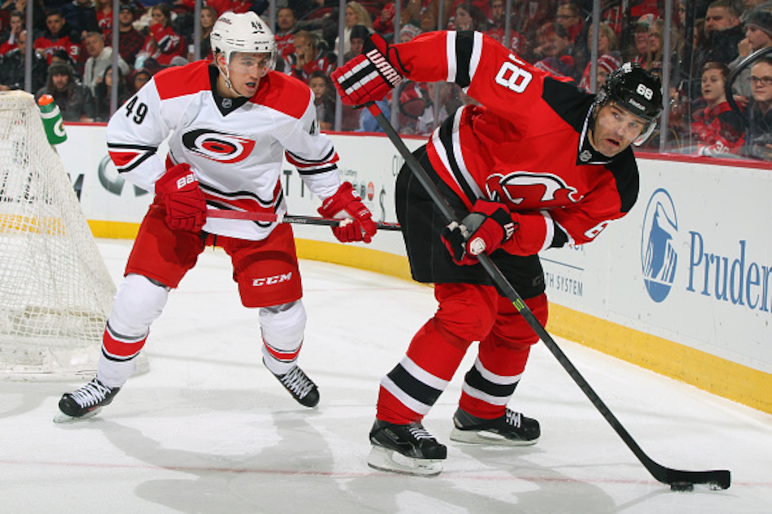 Jaromir Jagr controls the puck along the boards. Will he be in New Jersey past March 2?