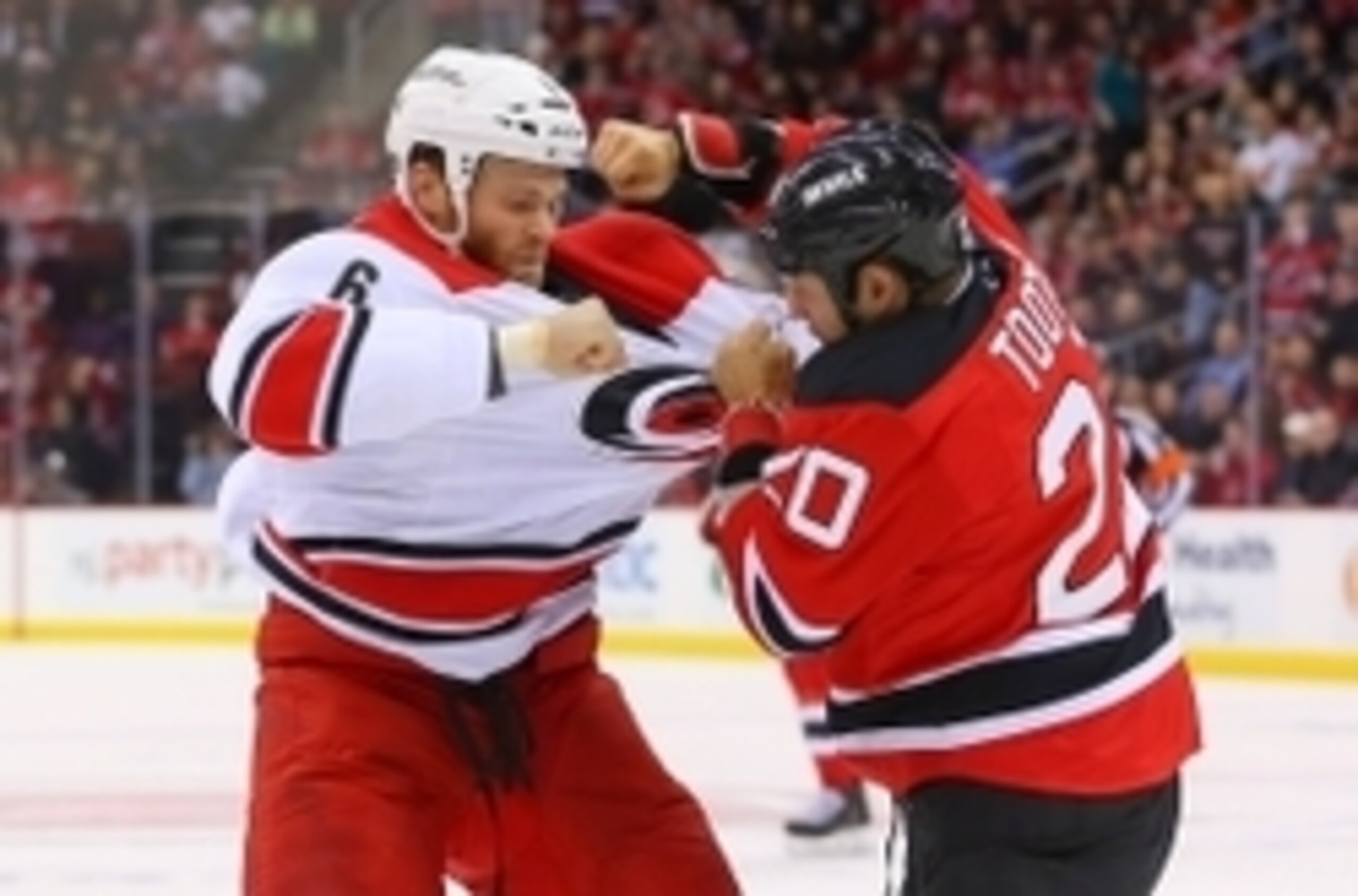 Tim Gleason fights with Jordin Tootoo.