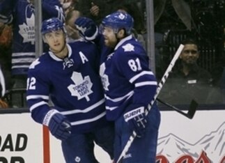 Tyler Bozak celebrates a goal with Phil Kessel.